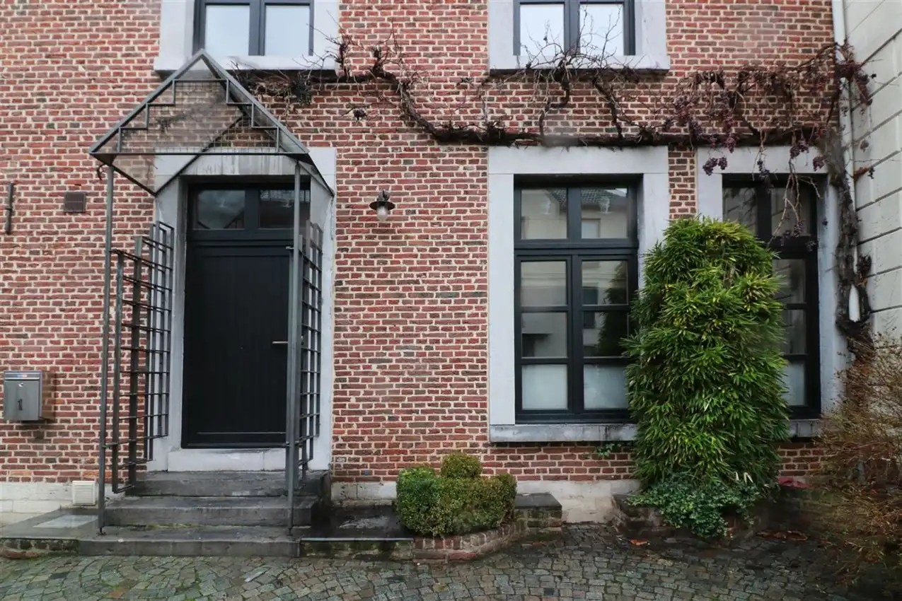 Voormalige patriciërswoning met 3 slpk., prachtige tuin en garage foto 23
