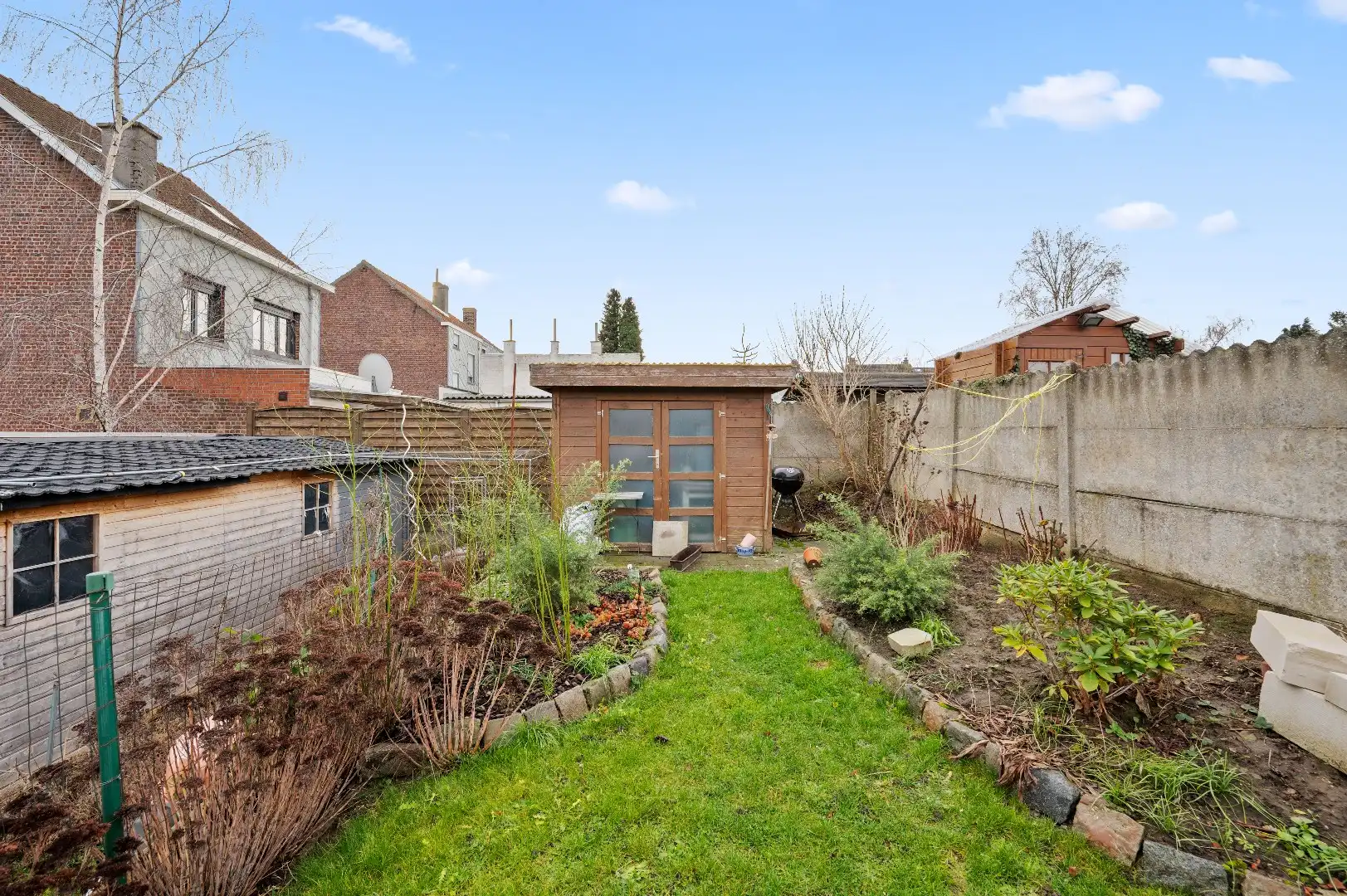 Instapklare rijwoning met 3 slaapkamers en een ruime tuin op de Tiense stadsrand. foto 21