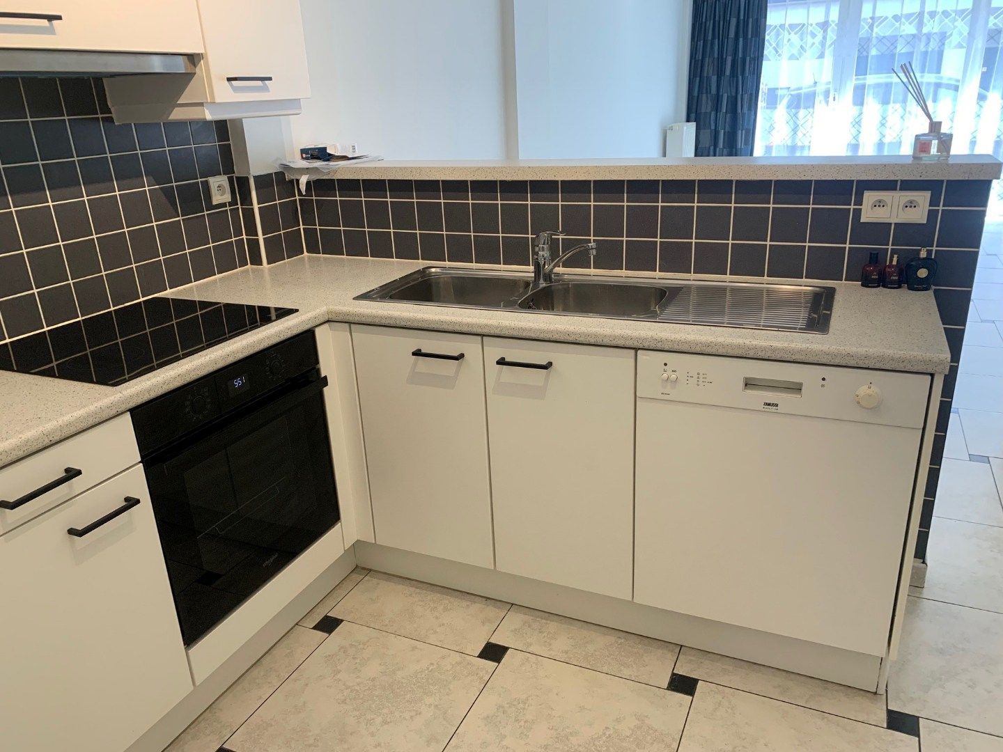 Opgefrist knap appartement op het gelijkvloers, eventueel met garagebox foto 12