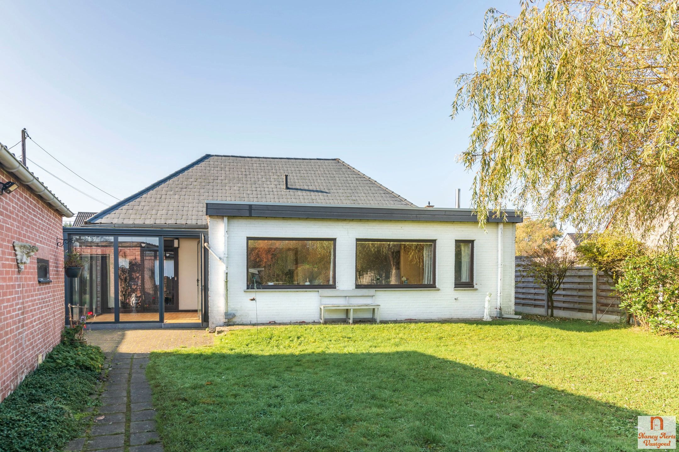 Sfeervolle gezinswoning met zonnige tuin in Paal foto 3