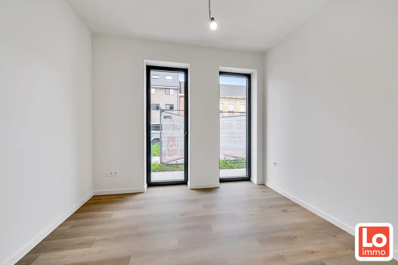 Prachtig ruim appartement (+/-96m²) met 2 slpk en mooi terras en afgesloten tuin foto 6