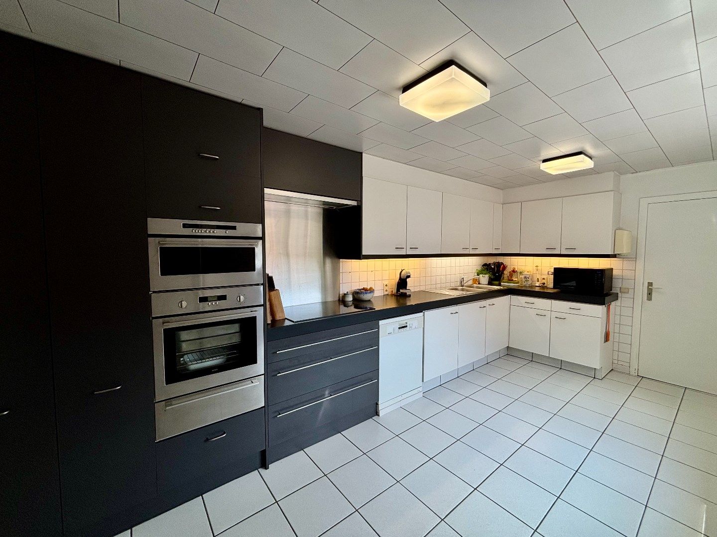 Gerenoveerde rijwoning in centrum Vlamertinge foto 14