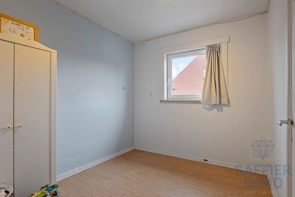 Halfopen bebouwing met zonnige tuin en 2 garages in rustige wijk te Izegem foto 17