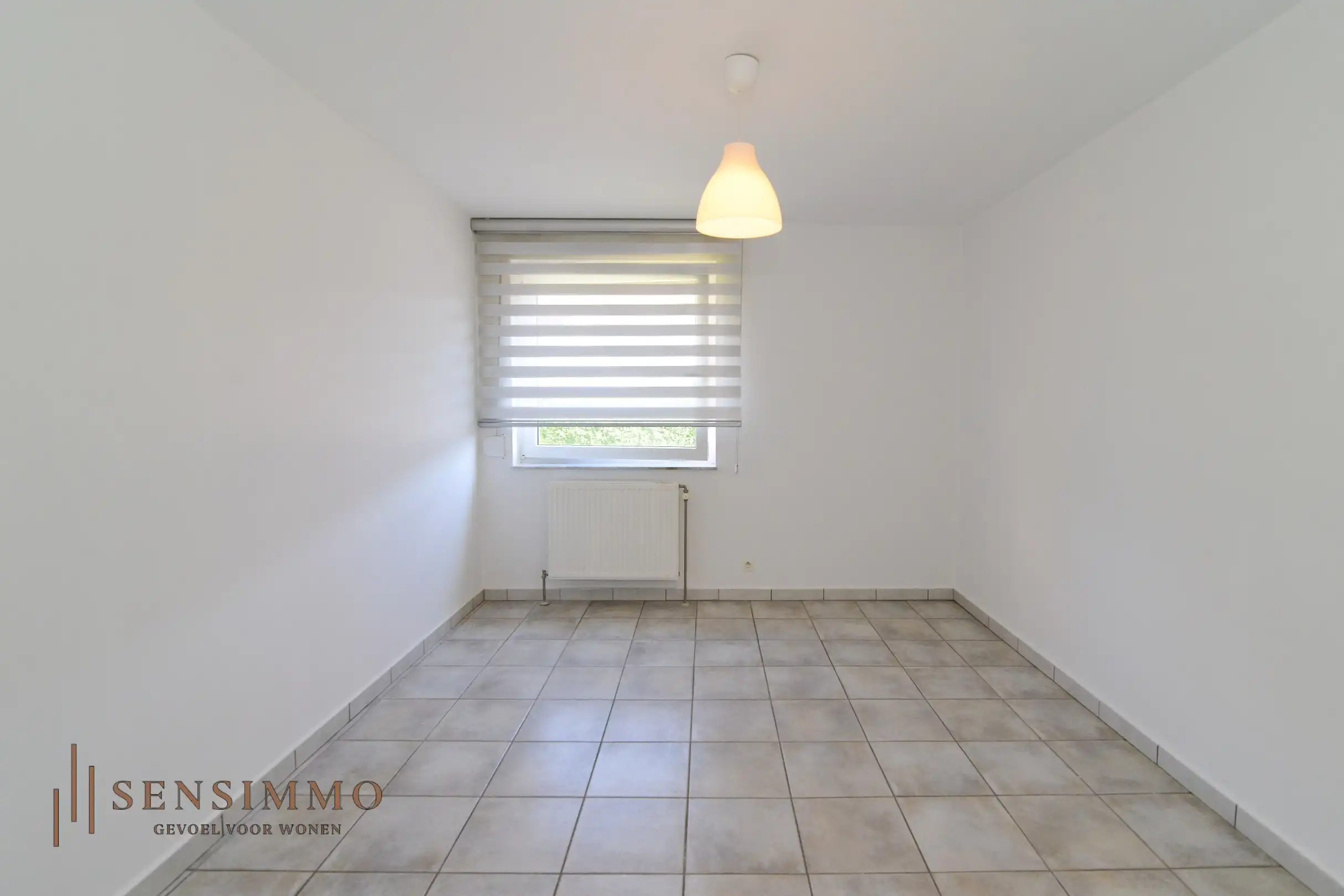 Instapklaar gelijkvloers appartement met 2 slpk foto 12