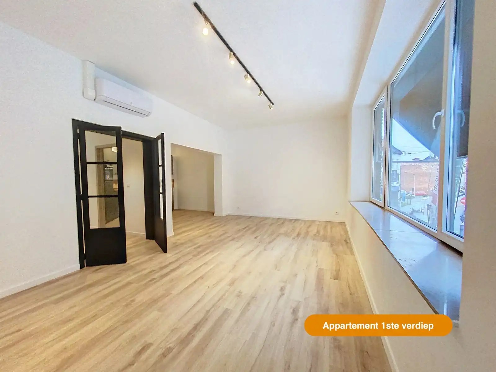 Unieke opbrengsteigendom met 2 appt + handel foto 9