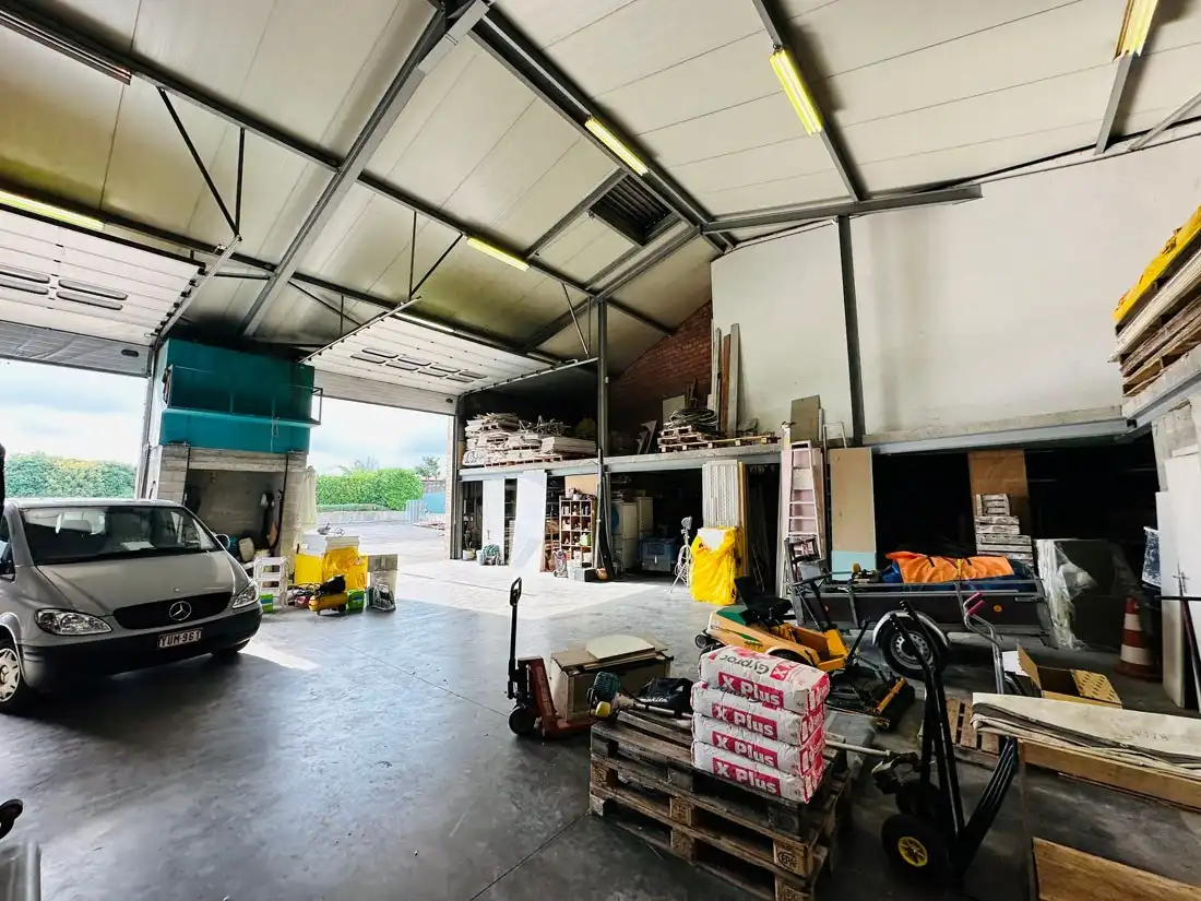 Ruim magazijn met kantoren met veel potentieel te Kuringen foto 20