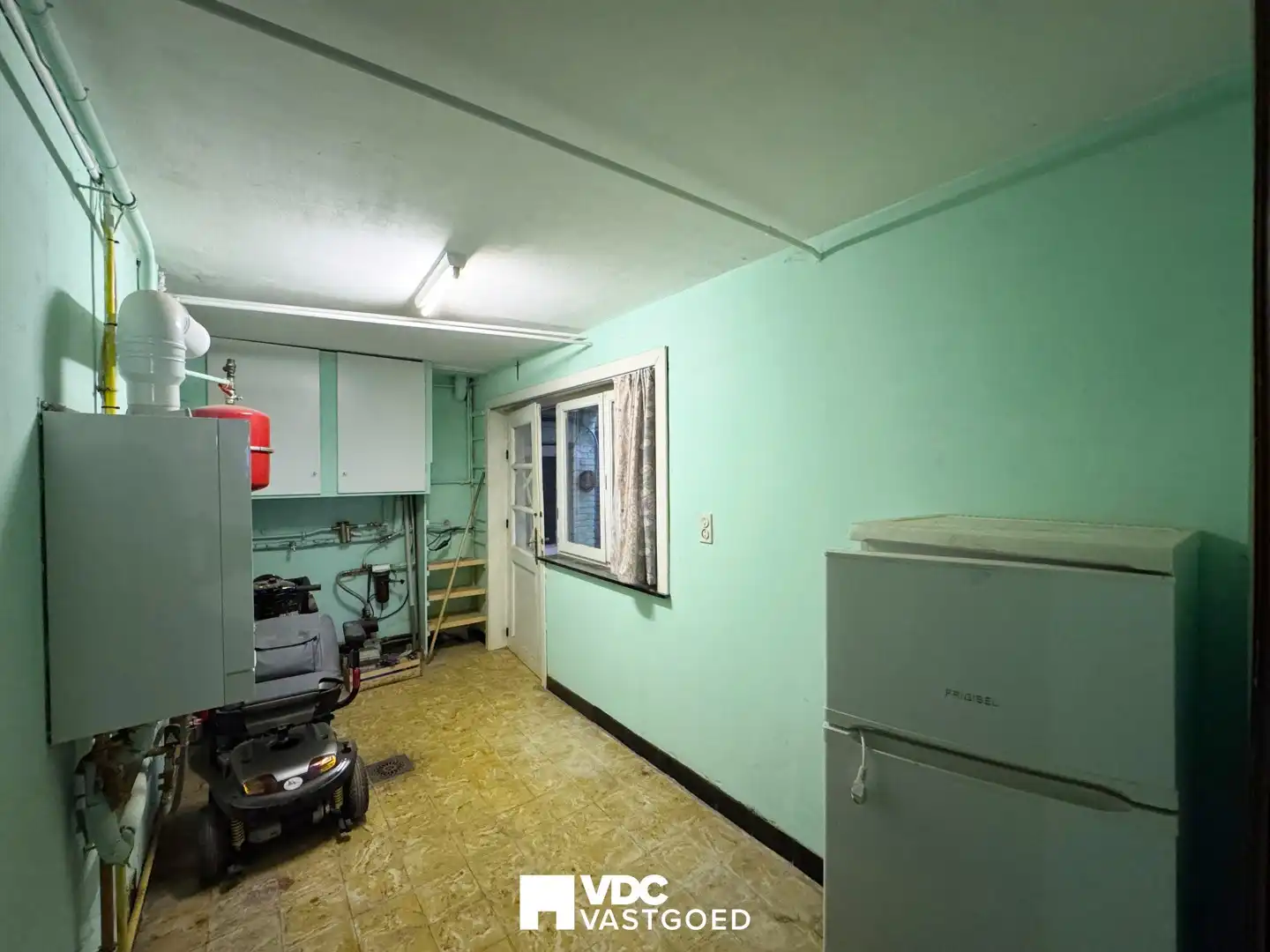 Te renoveren woning met werkplaats, garage en veel potentieel foto 23