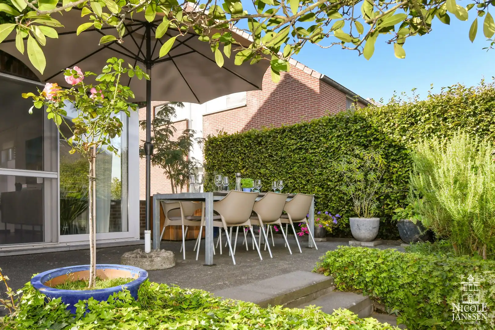 Instapklaar en ruim ingedeeld woonhuis met tuin foto 26