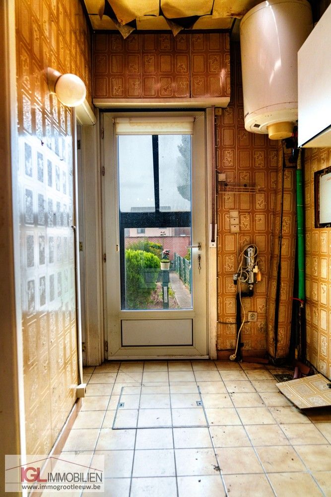Tweegevel met veel potentieel te koop in Halle foto 18