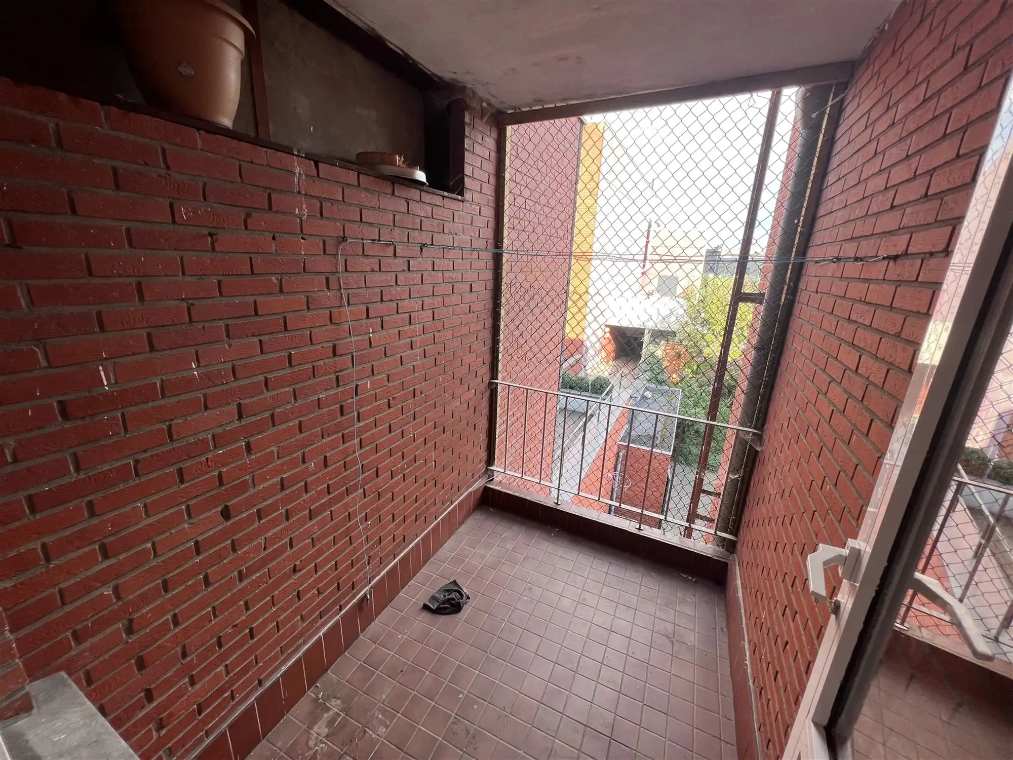 Opbrengsteigendom met 4 appartementen en tuin foto 10