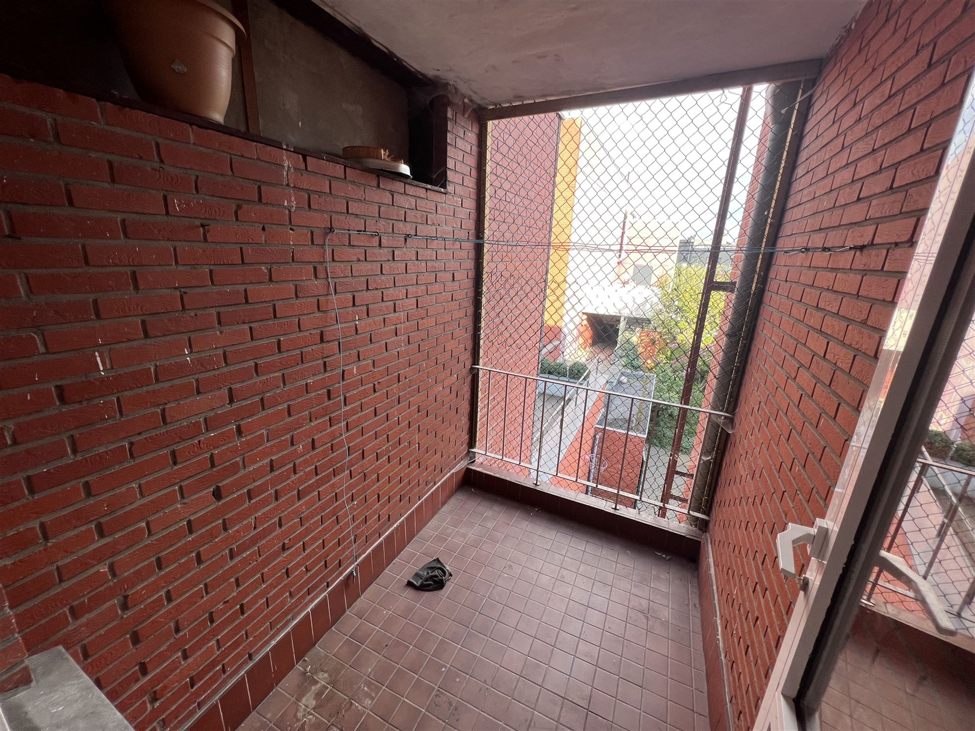 Opbrengsteigendom met 4 appartementen en tuin foto 10