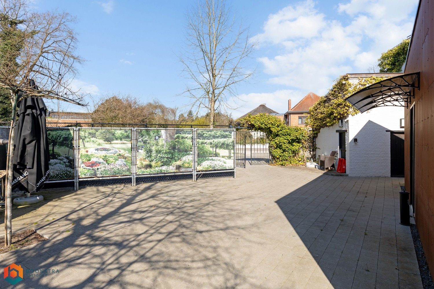 Grondig gerenoveerd handelsgelijkvloers met woonst en ruime parking foto 15