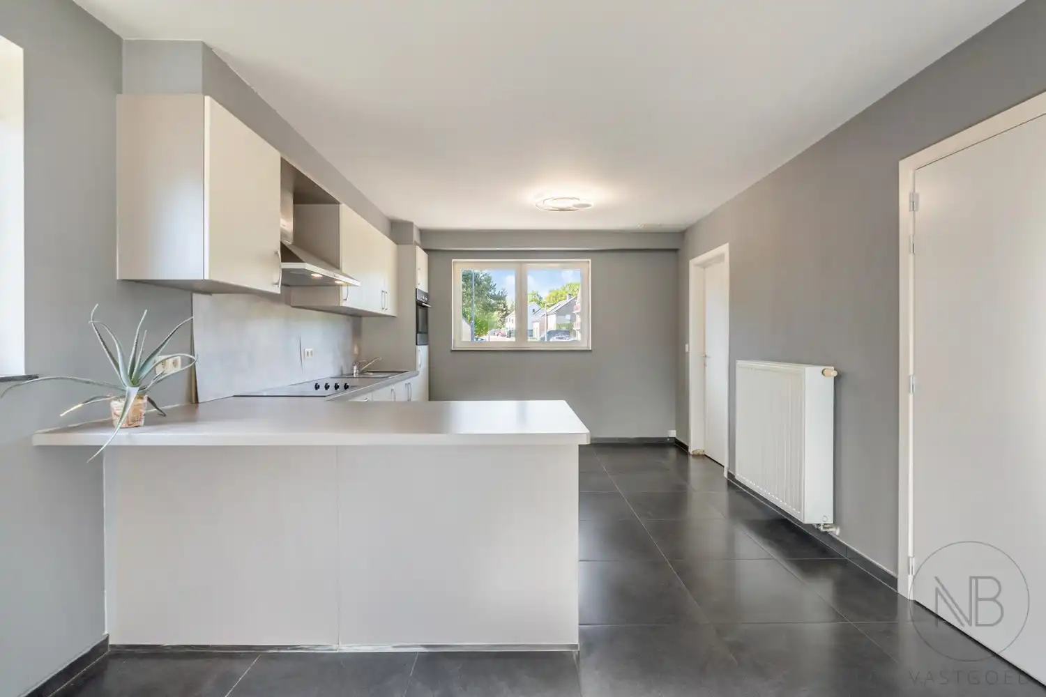 Ruim duplex appartement met 3 slaapkamers en groot terras in hartje Zutendaal foto 2