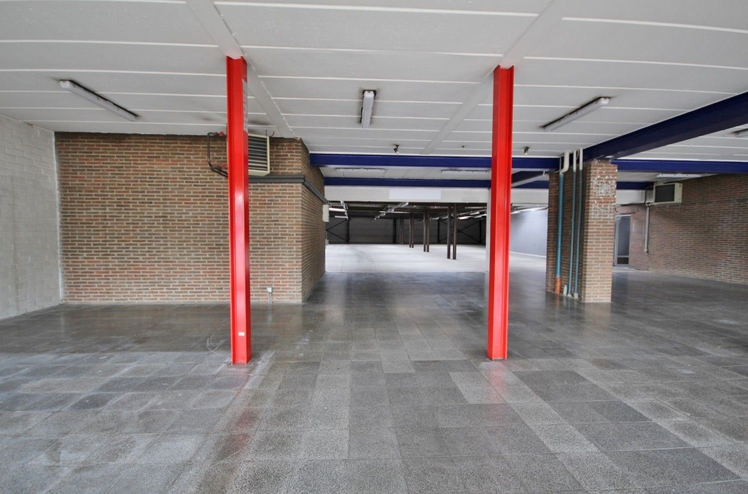 Ruim handelspand met magazijn op toplocatie foto 7