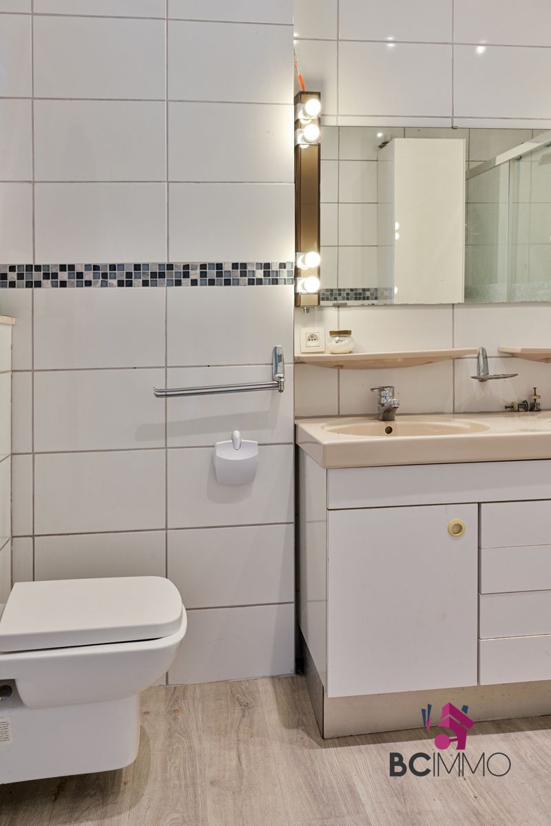 Handelswoonst met een triplex appartement te koop in Genk foto 7