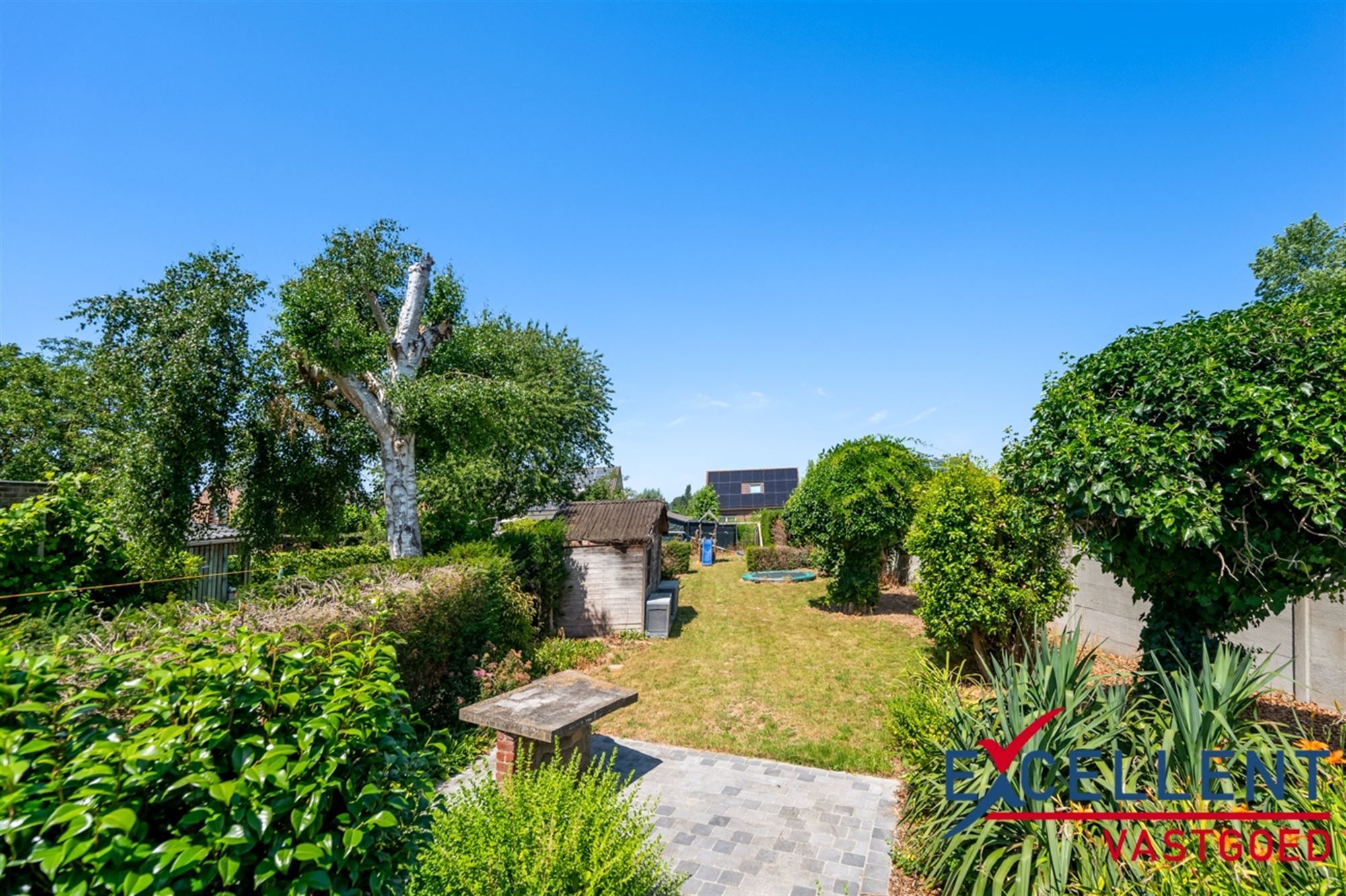 Charmante woning met prachtige tuin en bijhorend handelspand  foto 3