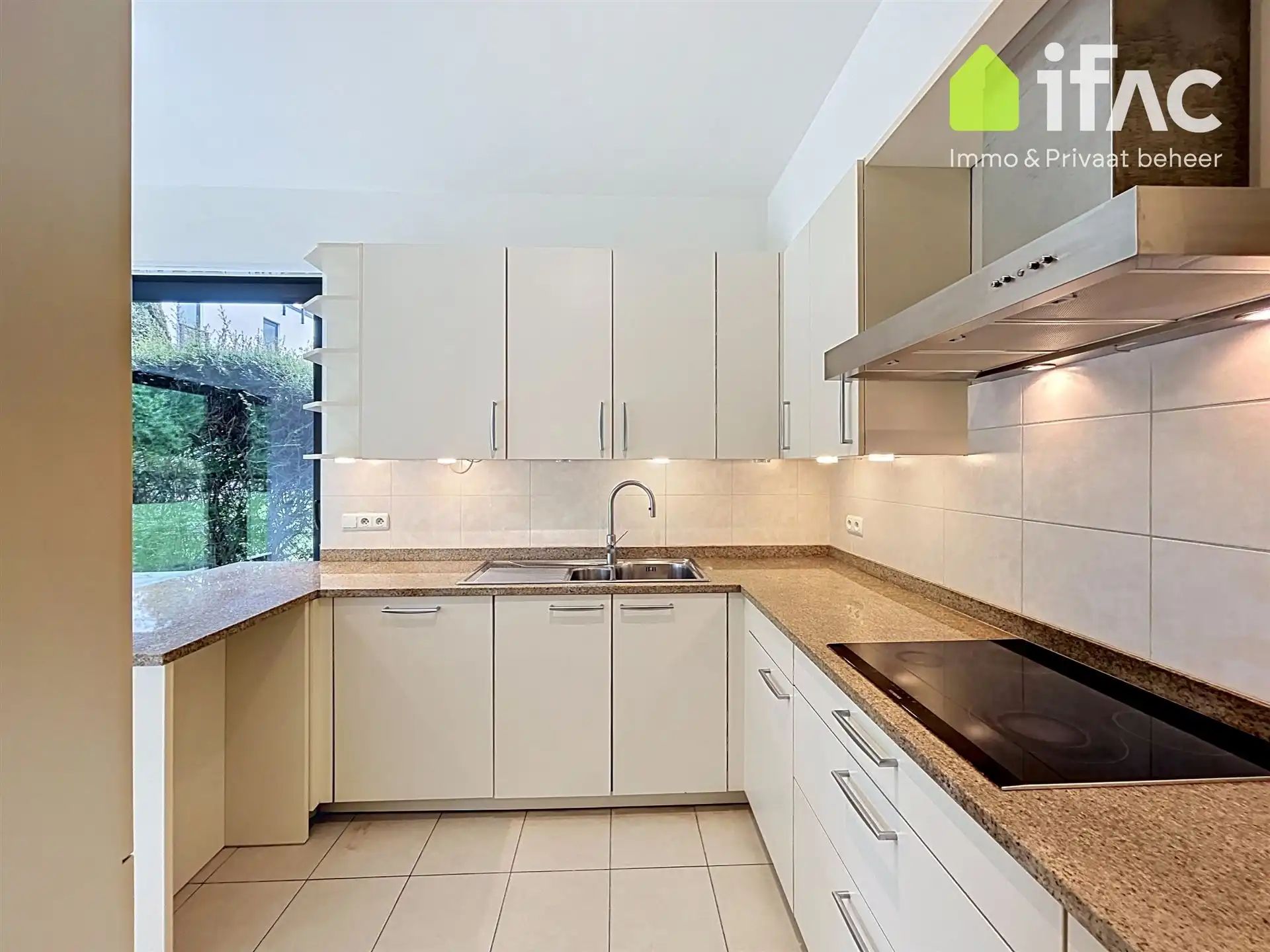 Exclusief gelijkvloers appartement met 2sk en privé tuin foto 11