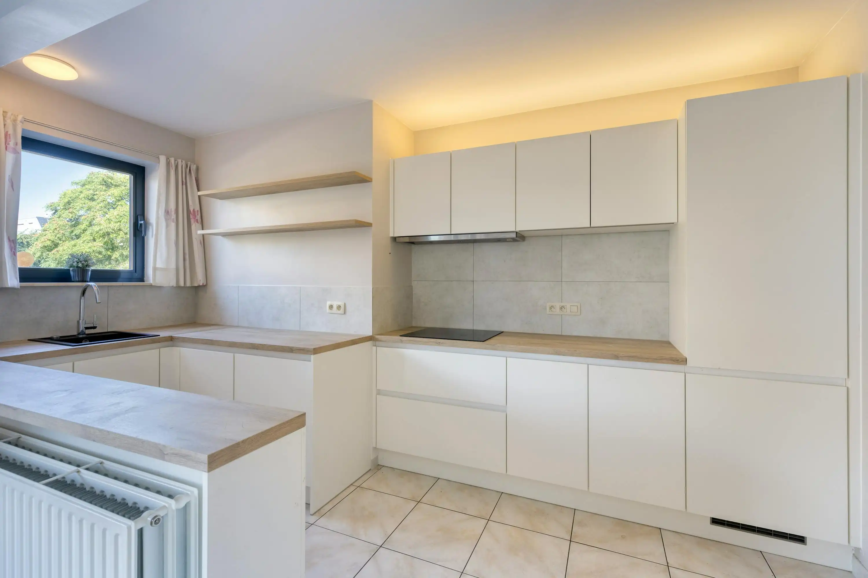 Appartement met 2-3 slaapkamers in centrum Oostkamp foto 4