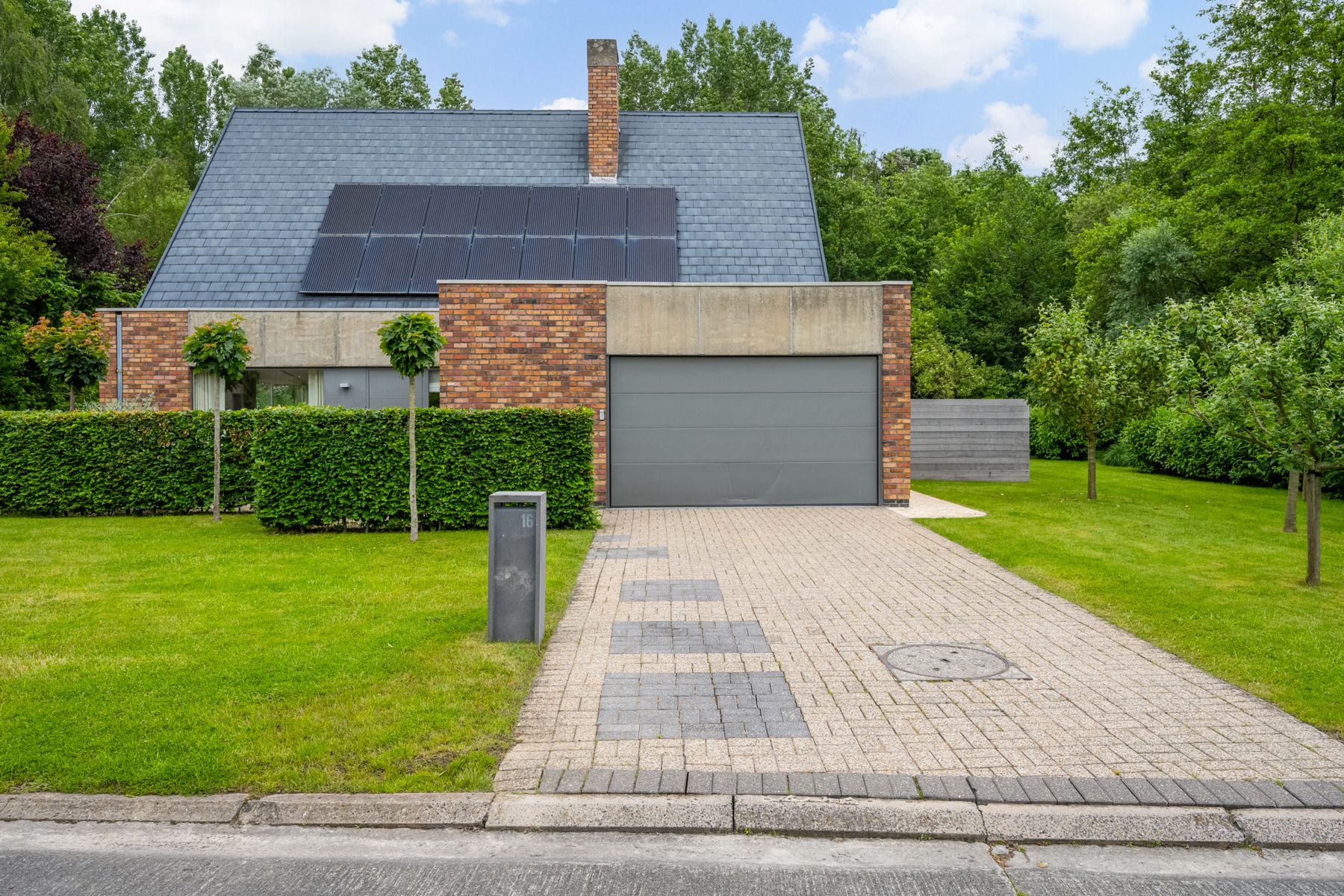 Energiezuinige villa met privé bos en prachtige tuin. foto 3