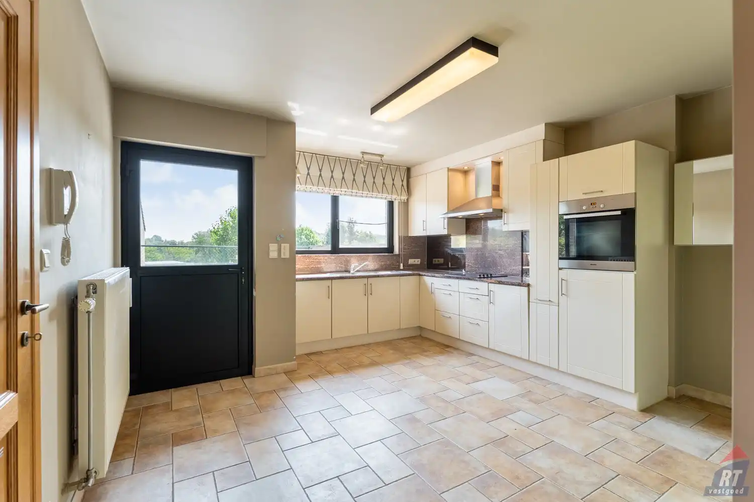 Gelijkvloers appartement met 2 slaapkamers, ruim terras en garage in Tongeren-Borgloon foto 5