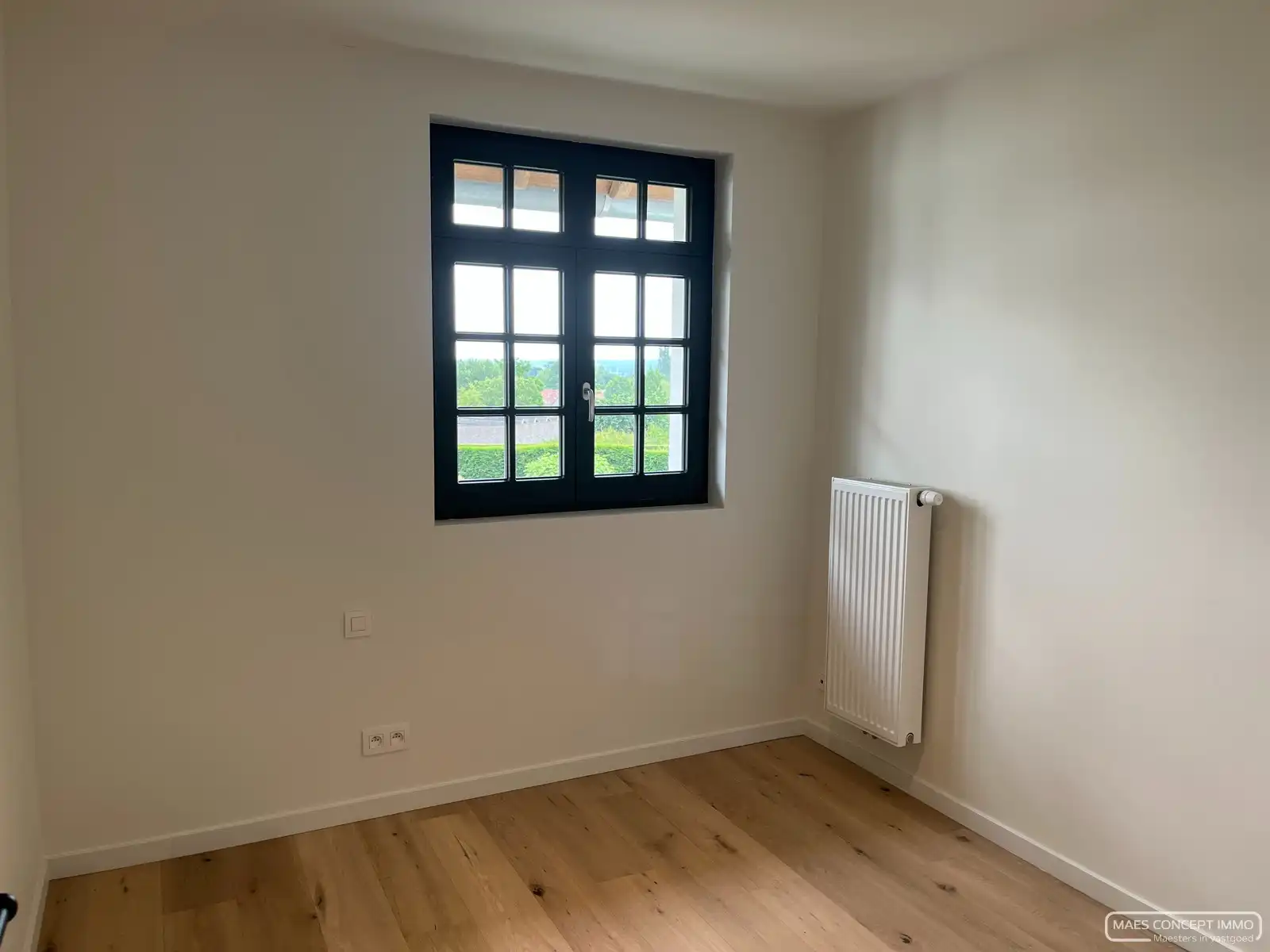 Ruime nieuwbouwwoning te huur in centrum Otegem foto 7