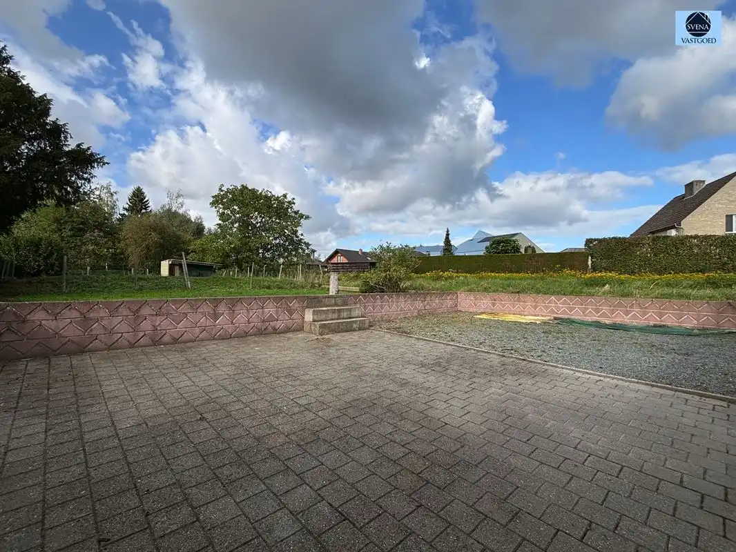 HALFOPENBEBOUWING MET 3 SLAAPKAMERS, TUIN EN GARAGE foto 11