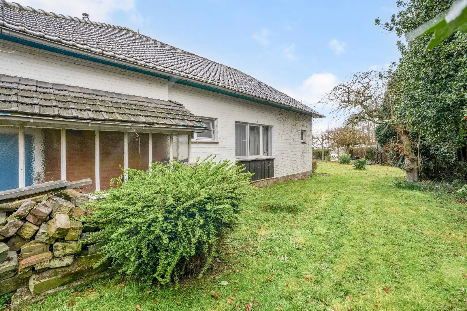 Op te knappen karakteristieke hoekwoning, 4 slpk, (EPC-label C) gelegen aan het Haspengouwse landschap. foto 9