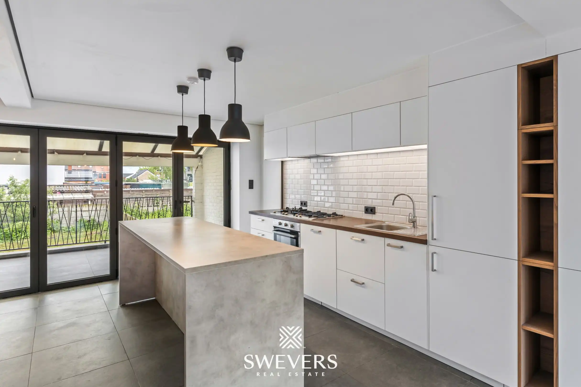 Instapklare en energiezuinige rijwoning met tuin, terras en garage in hartje Leopoldsburg foto 9