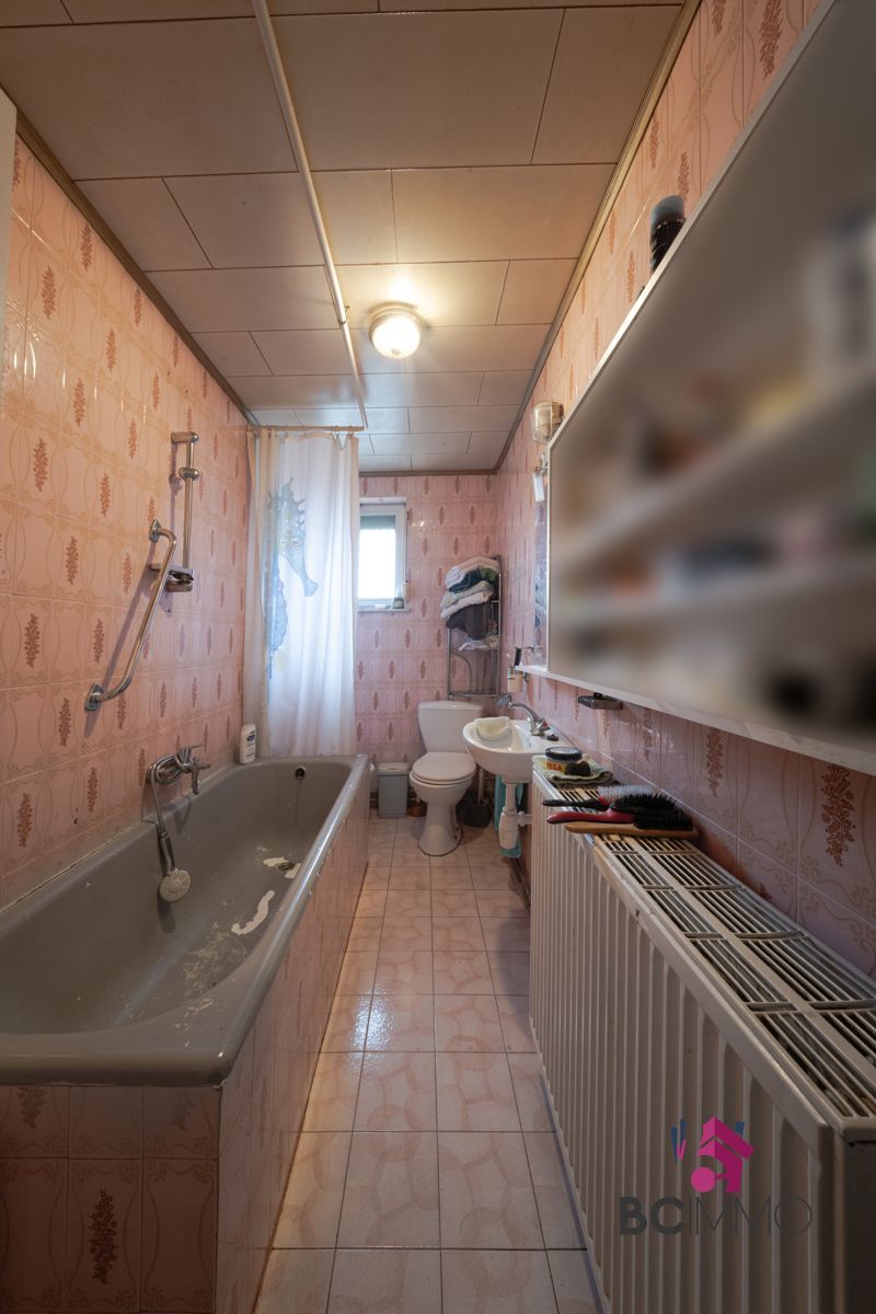 Ruime woning op een perceel van 8are in Houthalen-Oost foto 14