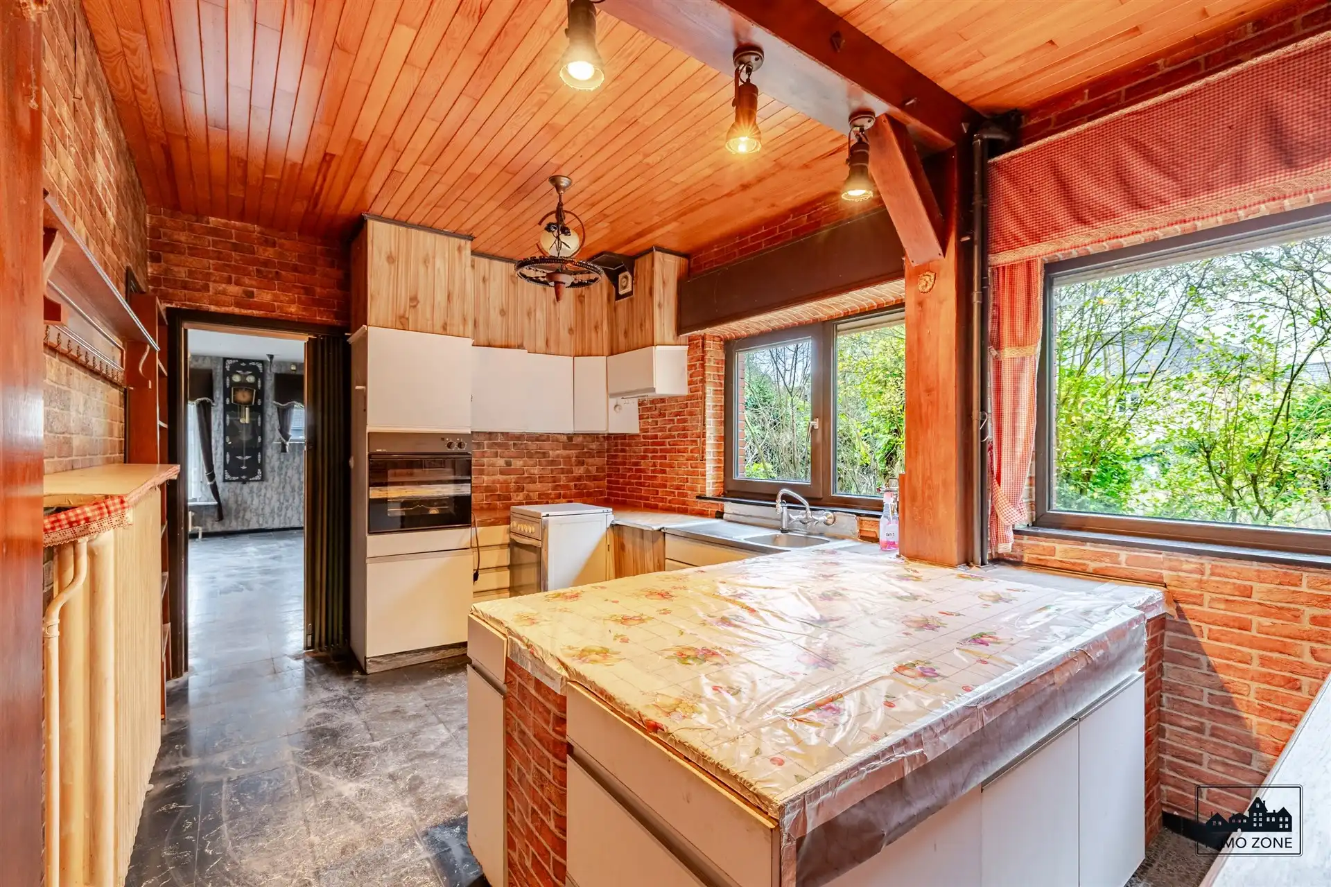 Te renoveren woning op ruim perceel met groene zone foto 7