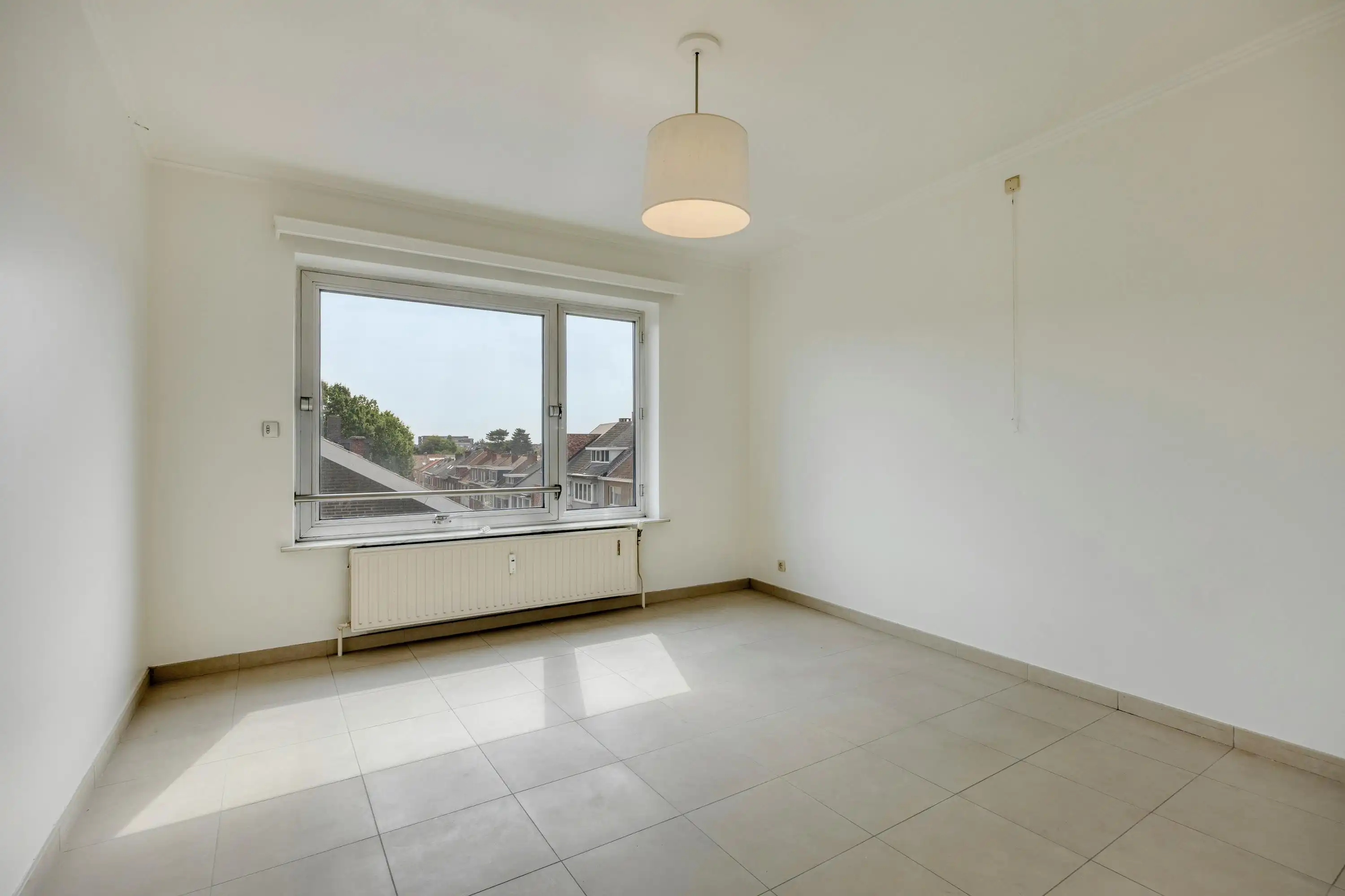 Drie slaapkamer appartement met garagebox en berging in het centrum van Hasselt foto 11