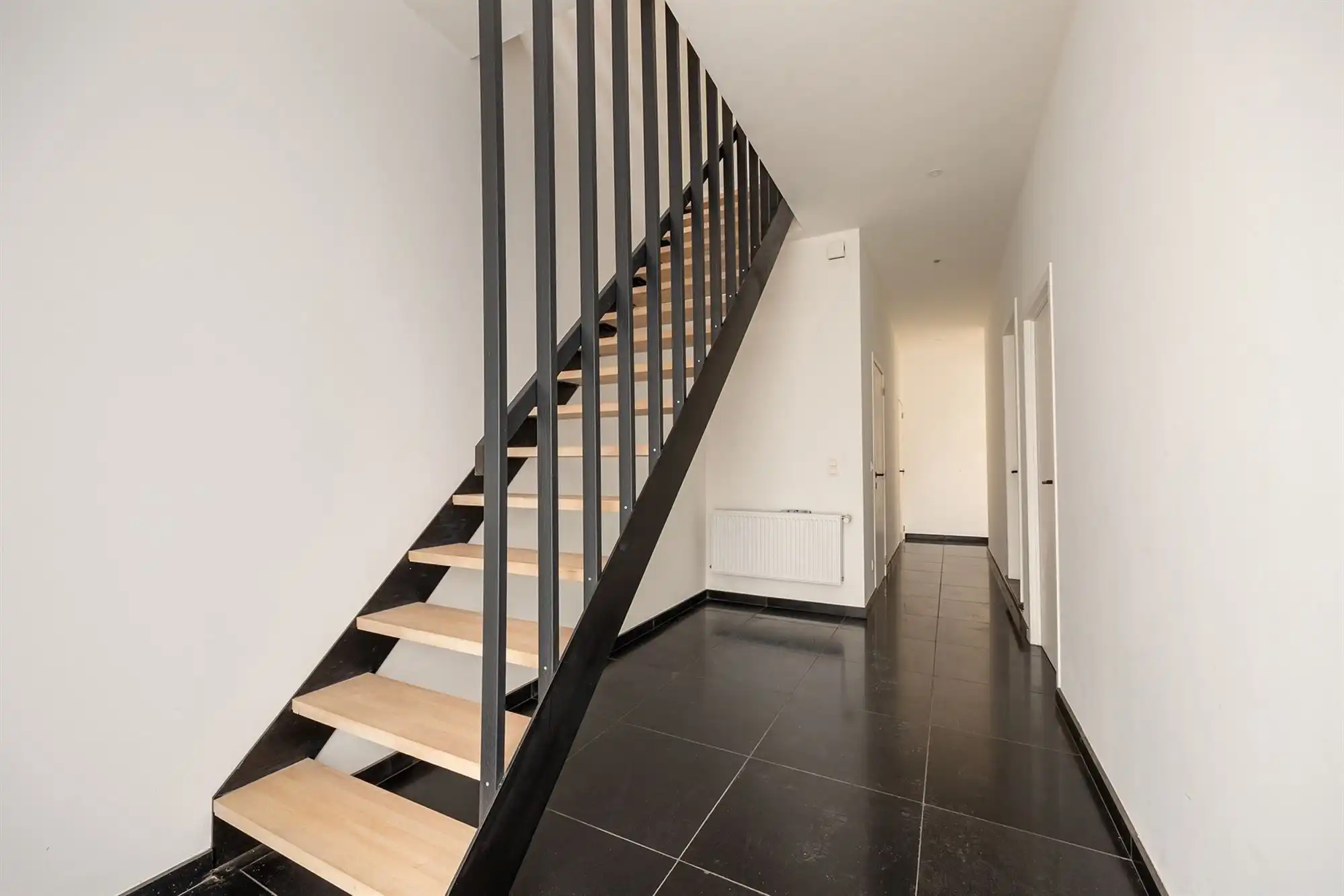 Ruime, energiezuinige woning met tuin in Rumst foto 9