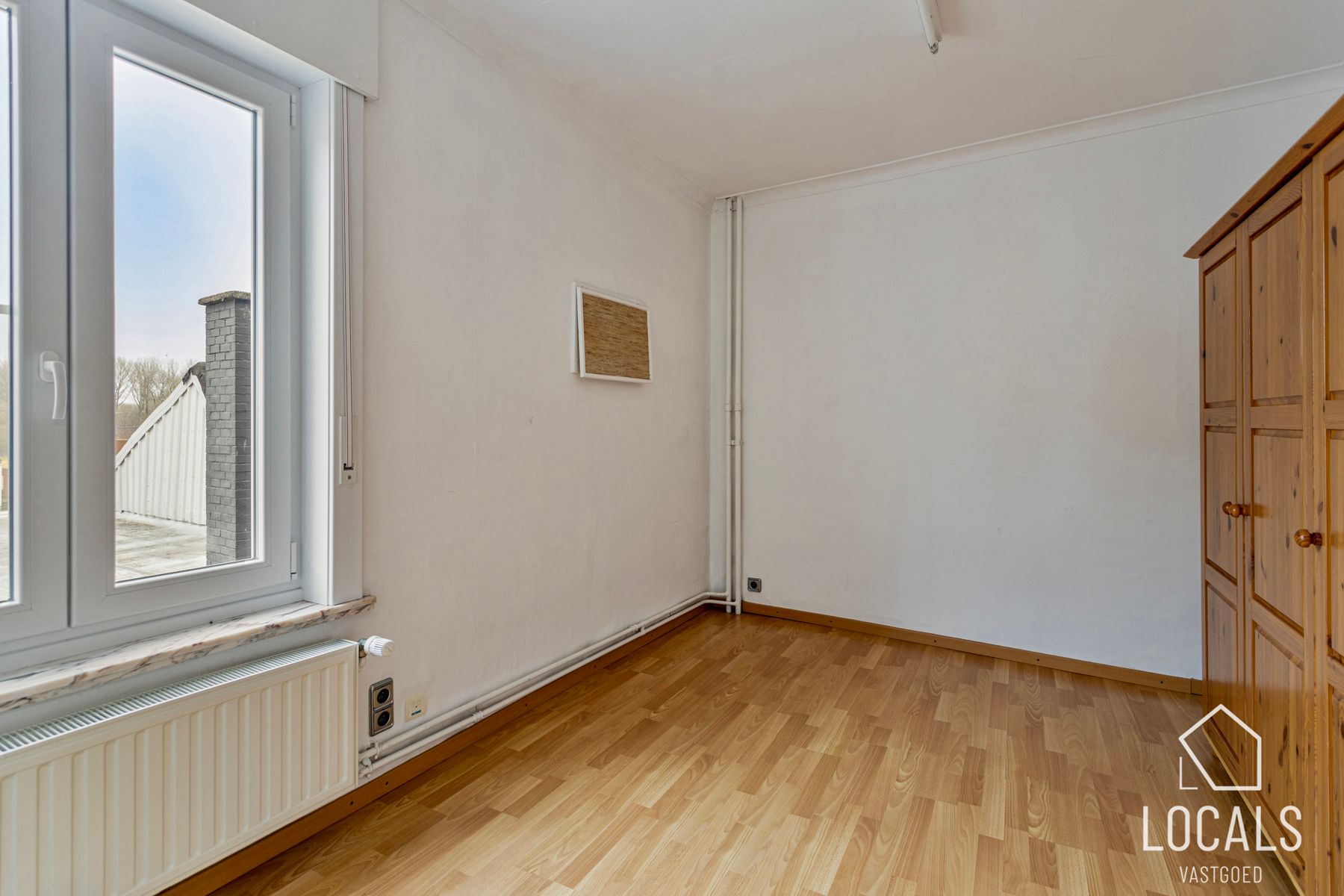 Veelzijdig pand: handelsruimte met woonst & parkeerplaatsen foto 14