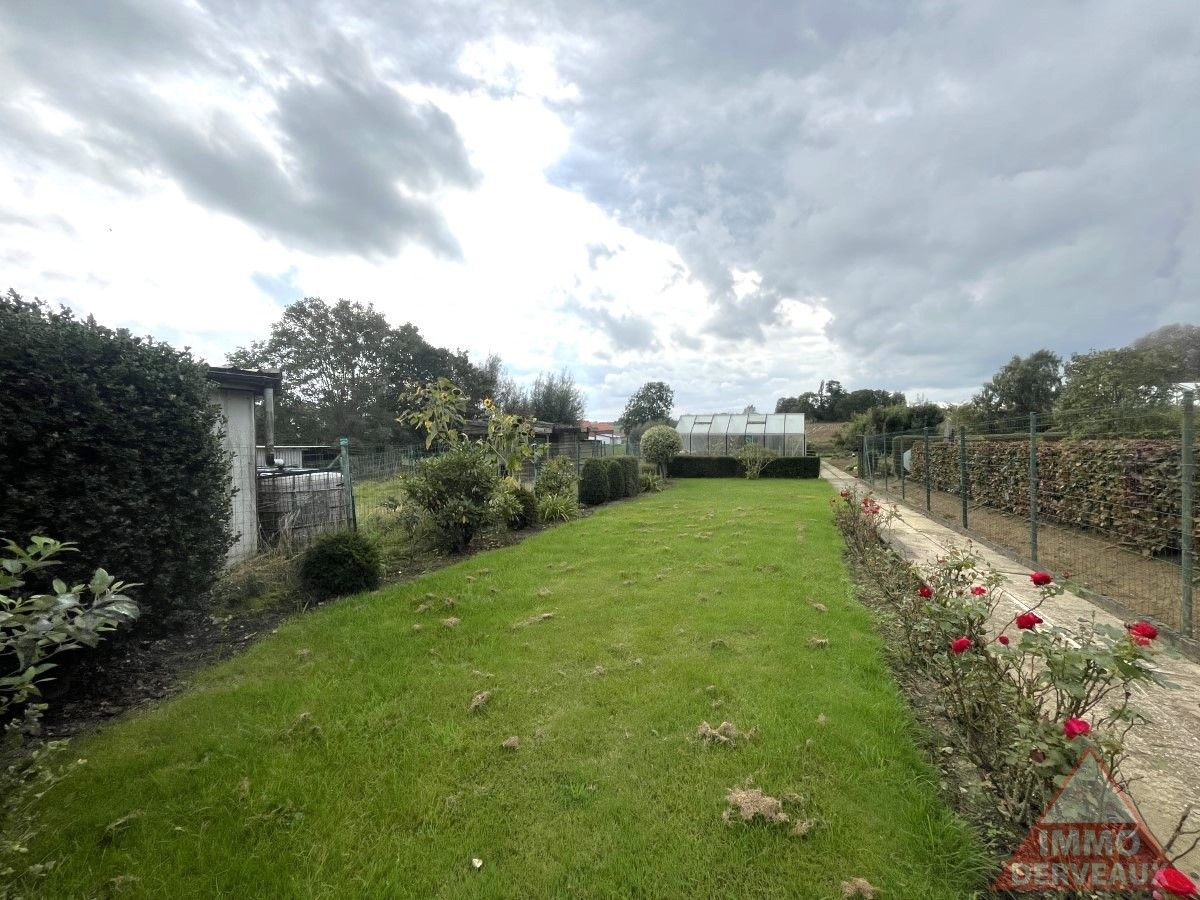 Geluveld - Open woning met grote tuin en zijoprit met garage foto 13