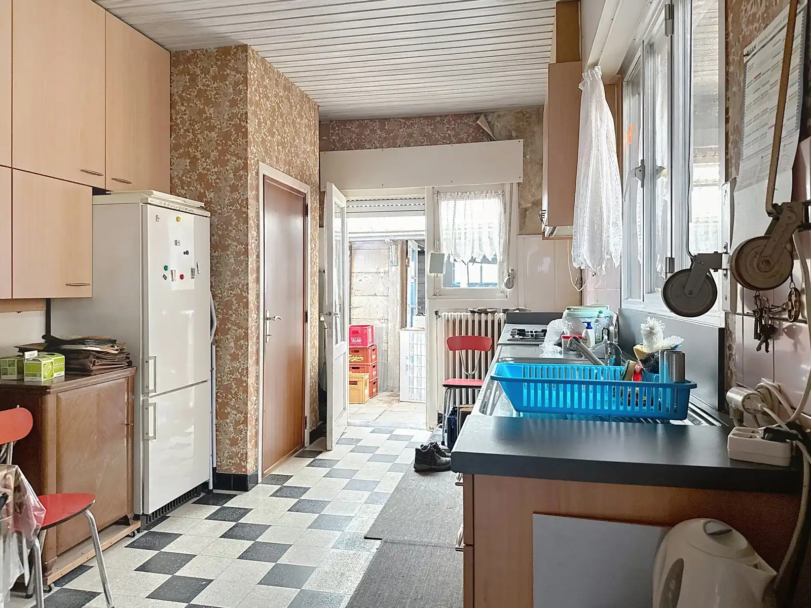 Centraal gelegen, te verbouwen woning. foto 25