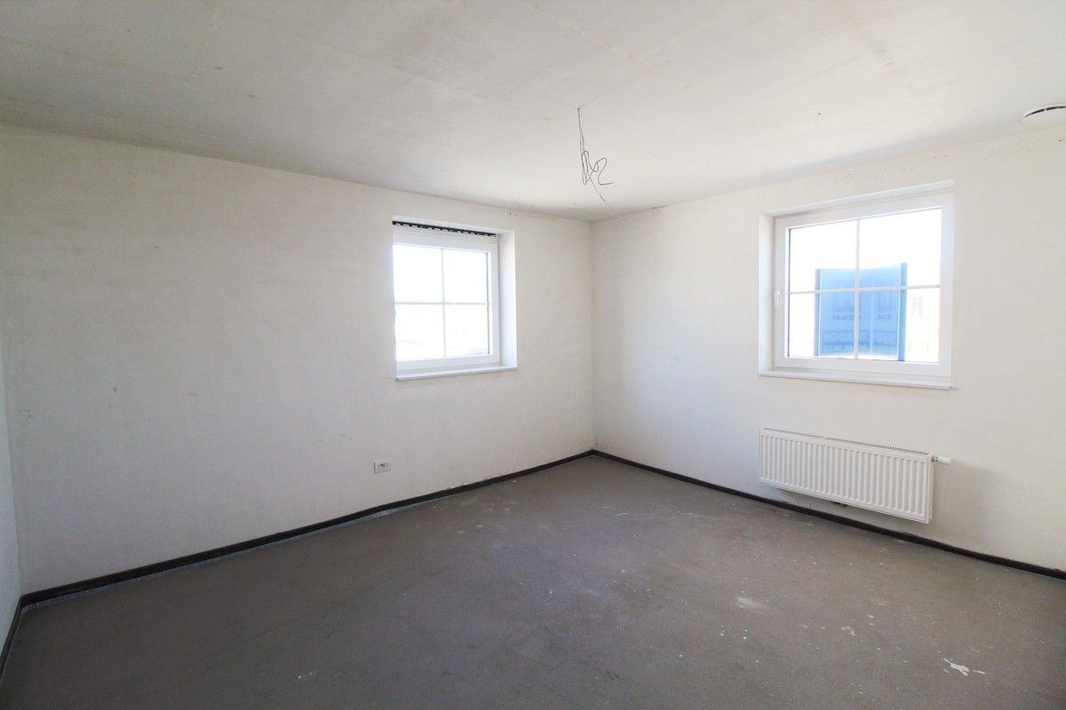 Halfopen nieuwbouwwoning met garage Roeselare foto 10