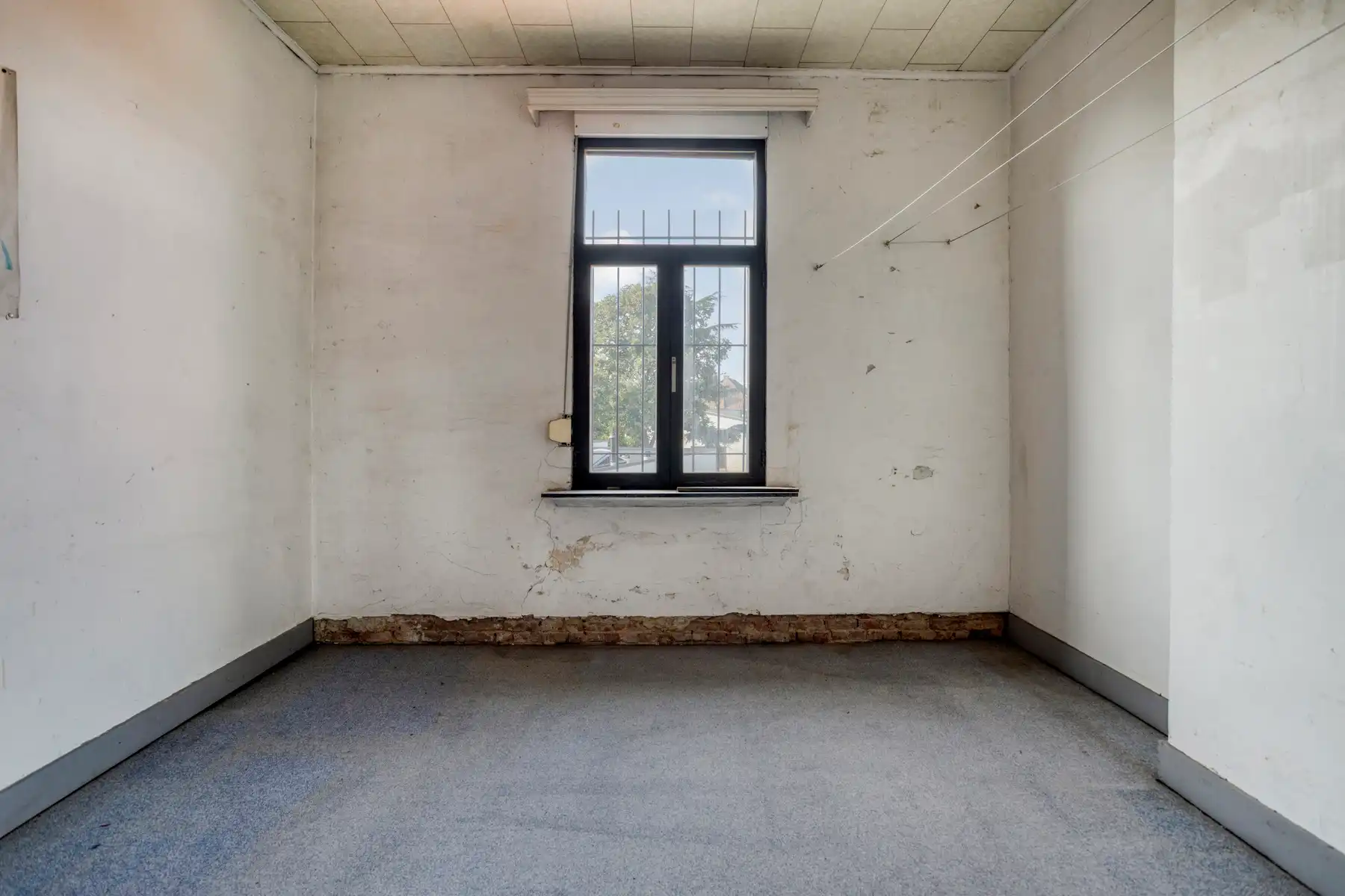 Te renoveren woning met ruime tuin aan Fort II Wommelgem. foto 15