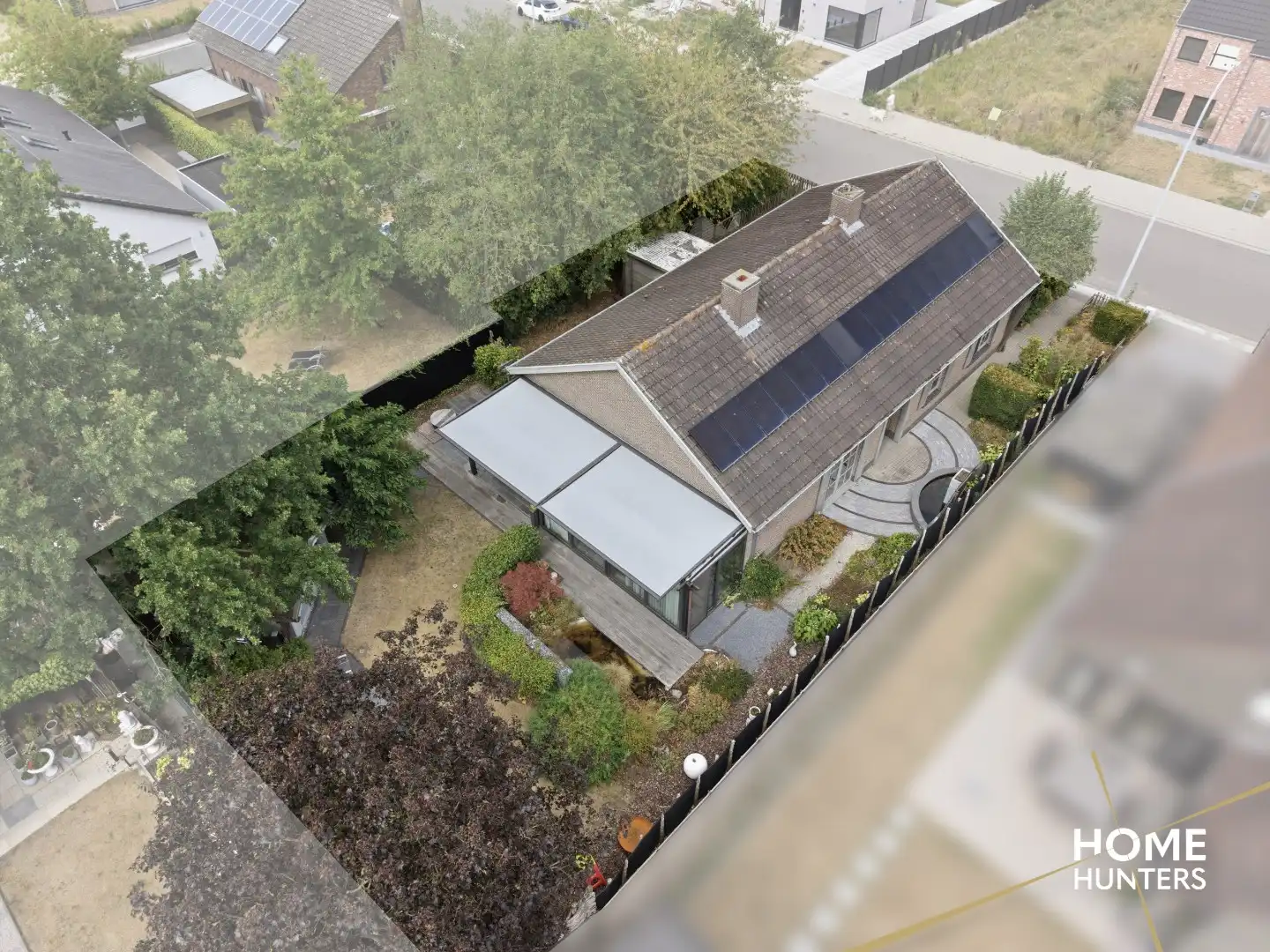 Alleenstaande woning met prachtige tuin en tal van extra troeven in een rustige wijk te Wervik foto 3