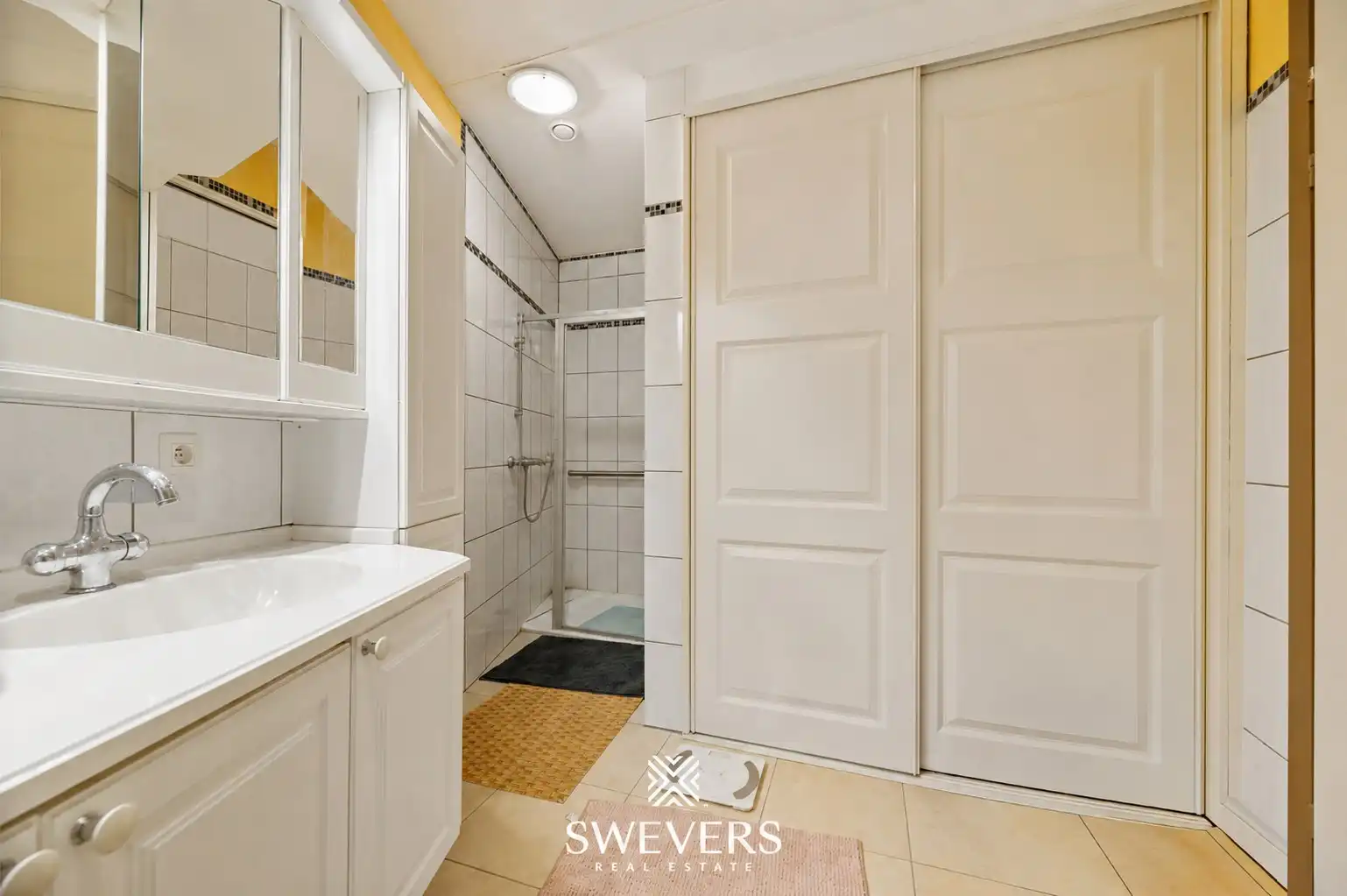 Ruim gelijkvloers appartement met twee slaapkamers foto 13