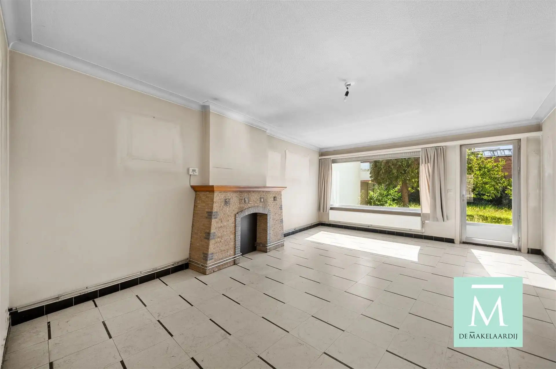 Ruime woning met 3 slaapkamers, aangename tuin en inpandige garage foto 4