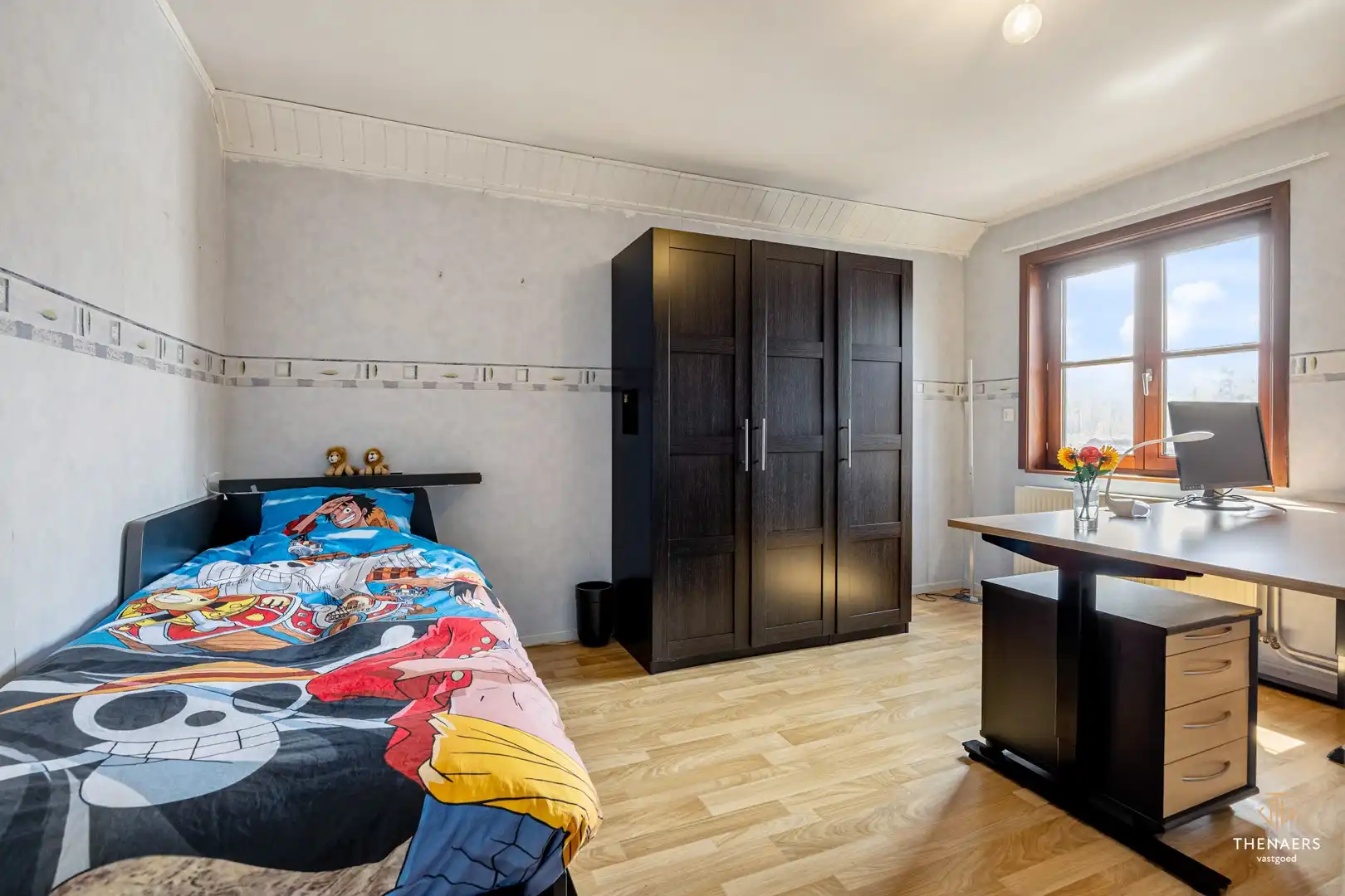 Ruime halfopen woning met 3 slaapkamers en prachtige tuin. foto 14