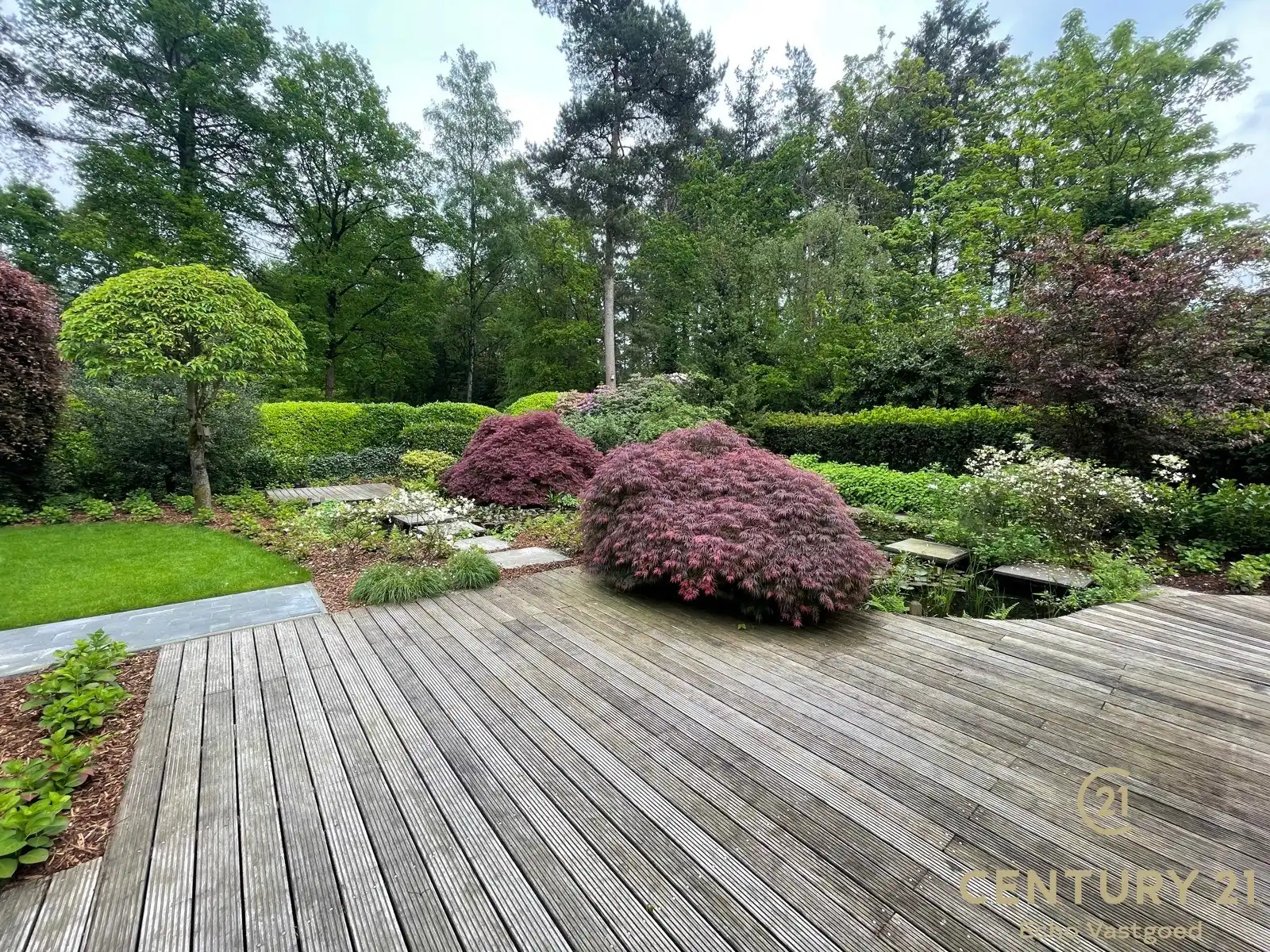 Gelijkvloerse fraaie villa met prachtige tuin op ca 1700m² foto 9