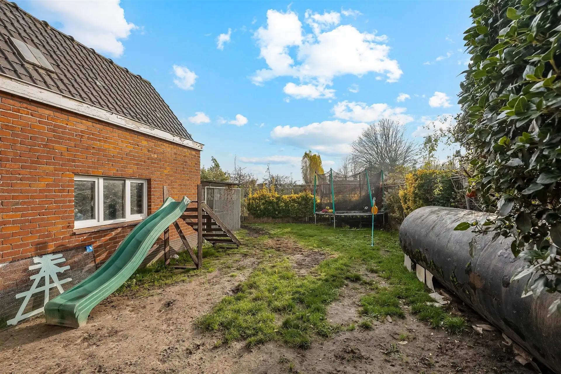 Op te frissen woning met supertoffe tuin, nabij het centrum! foto 23