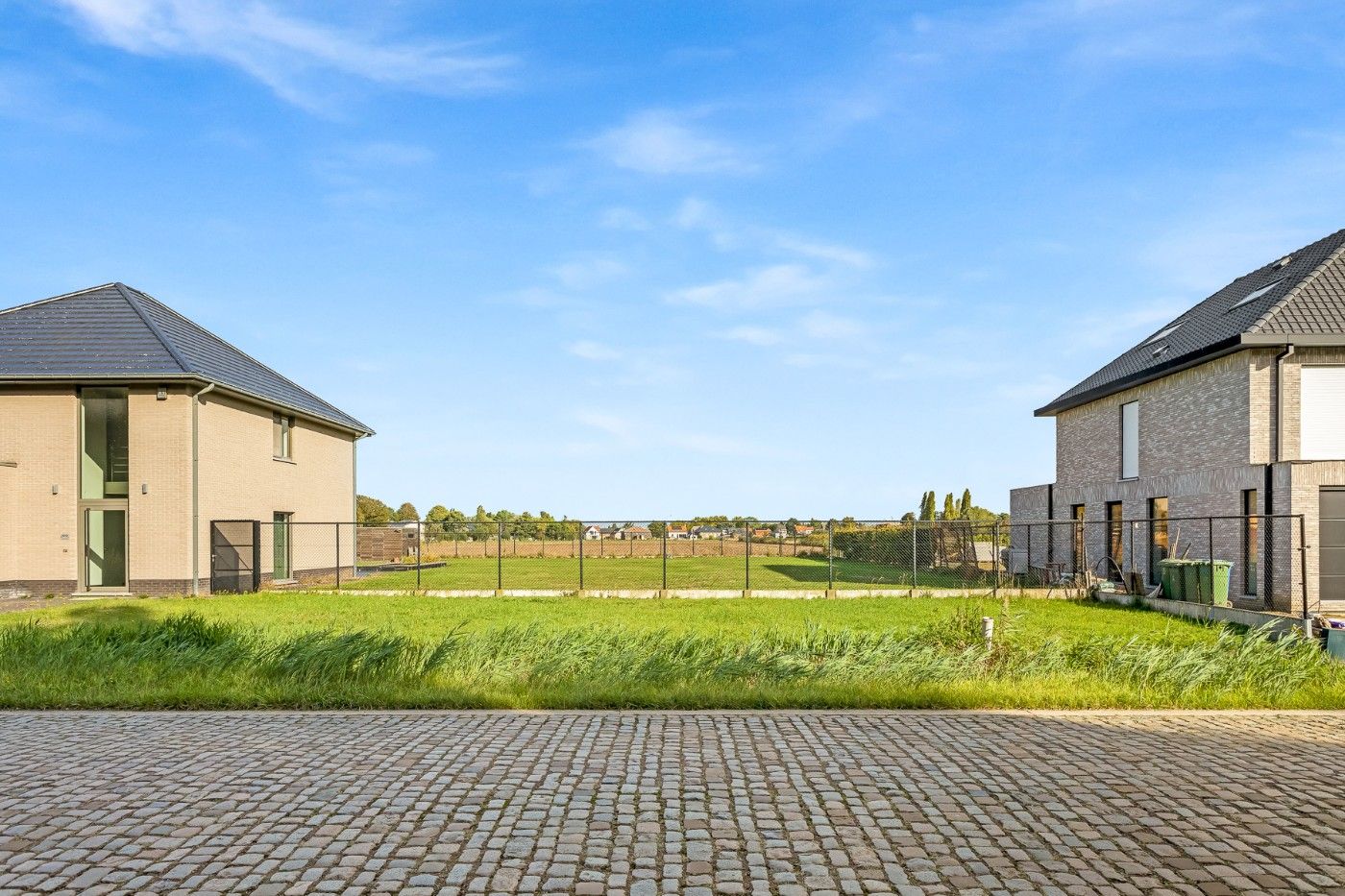 Mooi gelegen bouwgrond van 493m² voor HOB met garage en tuin foto 7