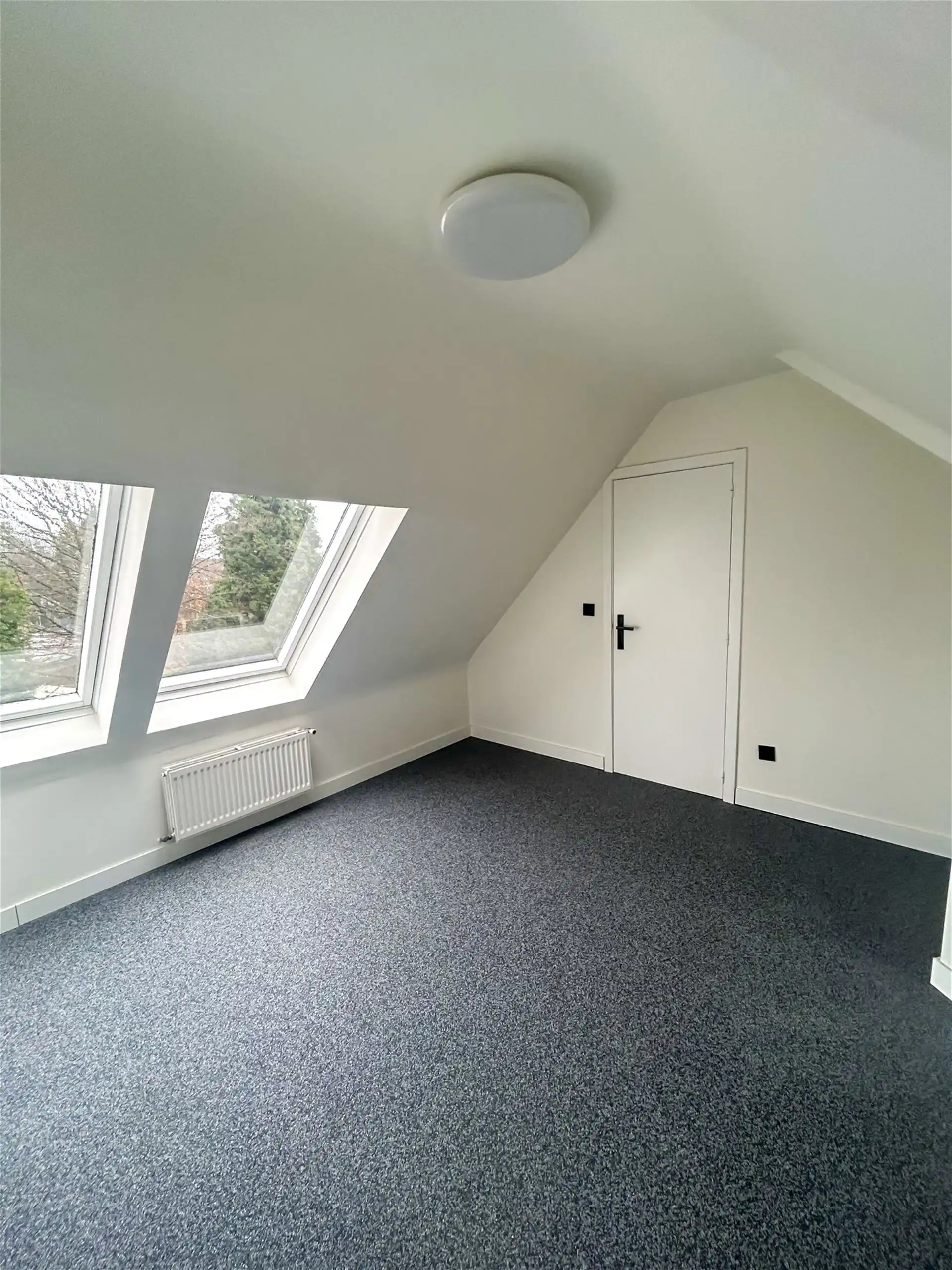 Appartement met 1 slaapkamer, terras en privatieve autostaanplaats in Maasmechelen! foto 4