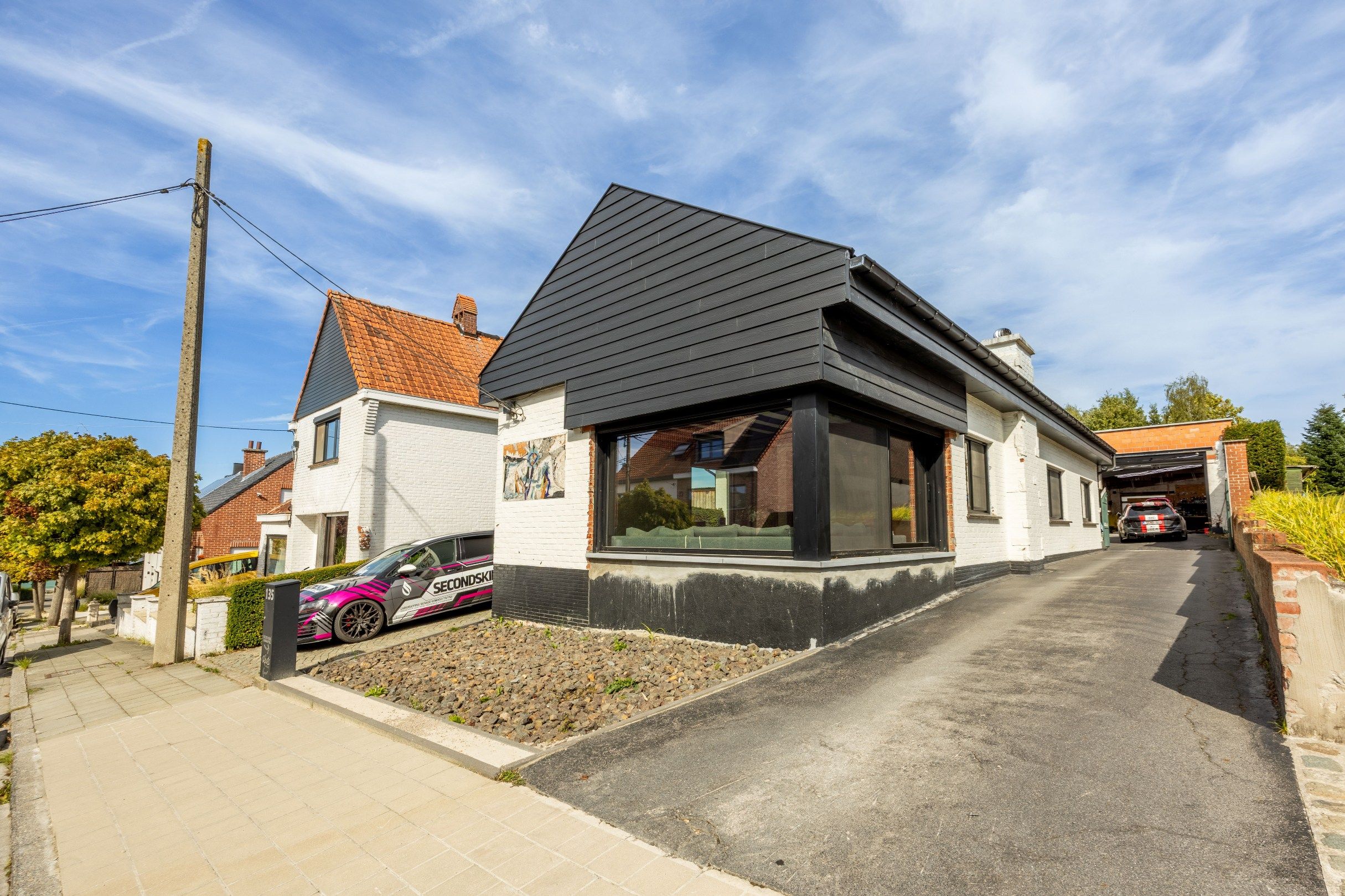 ALLEENSTAANDE GELIJKVLOERSE WONING MET MAGAZIJN EN COMMERCIELE RUIMTE foto 2