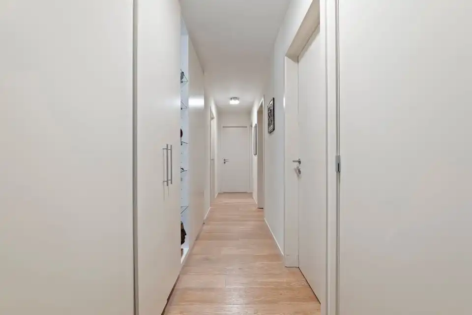 MODERN GELIJKVLOERS APPARTEMENT MET TERRAS EN STAANPLAATS IN SINT-TRUIDEN foto 14