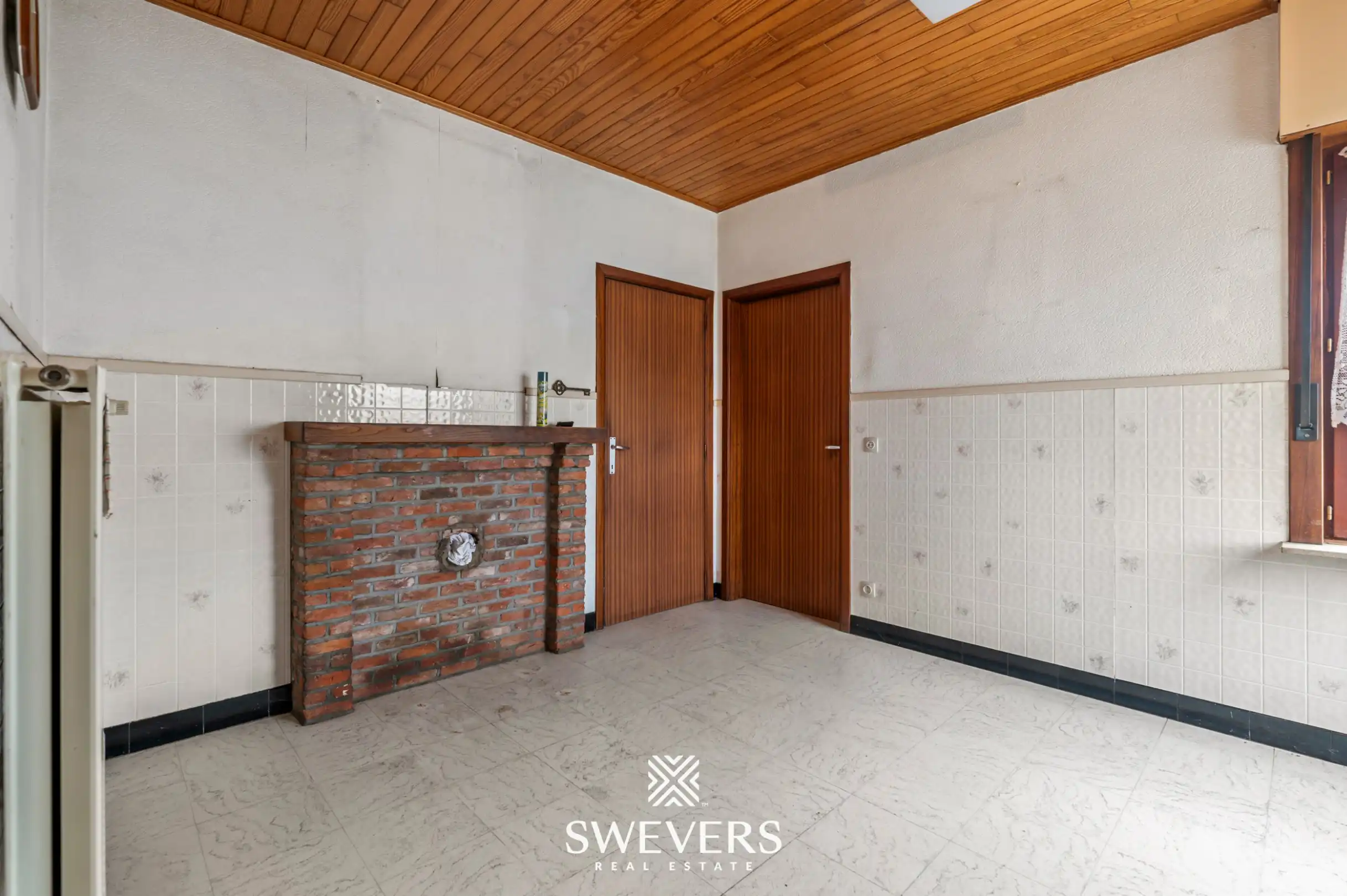 Te renoveren halfopen woning met ruim perceel in Diest foto 10