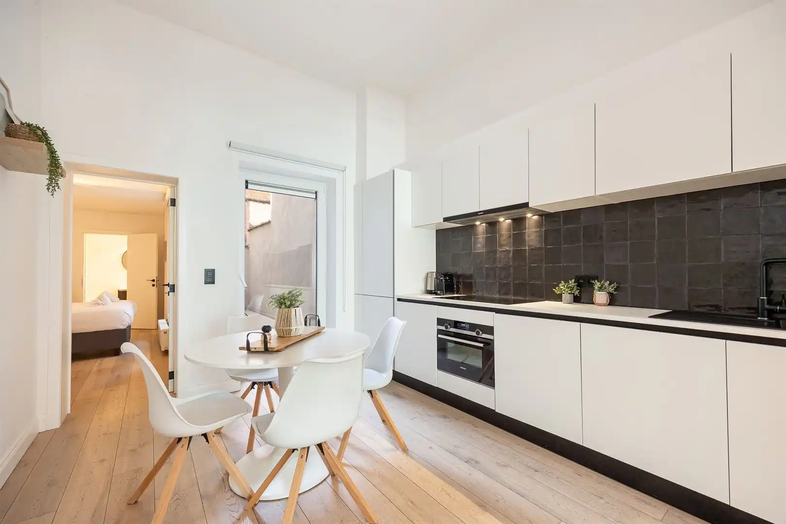 Gelijkvloers met zalig koertje in BOHO foto 6