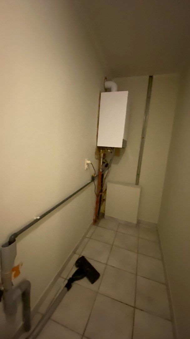Halfopen bebouwing met tuin, carport en drie slaapkamers in Eksaarde foto 8
